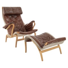 Fauteuil de salon moderne  Pernilla  en cuir cognac de Bruno Mathsson pour DUX