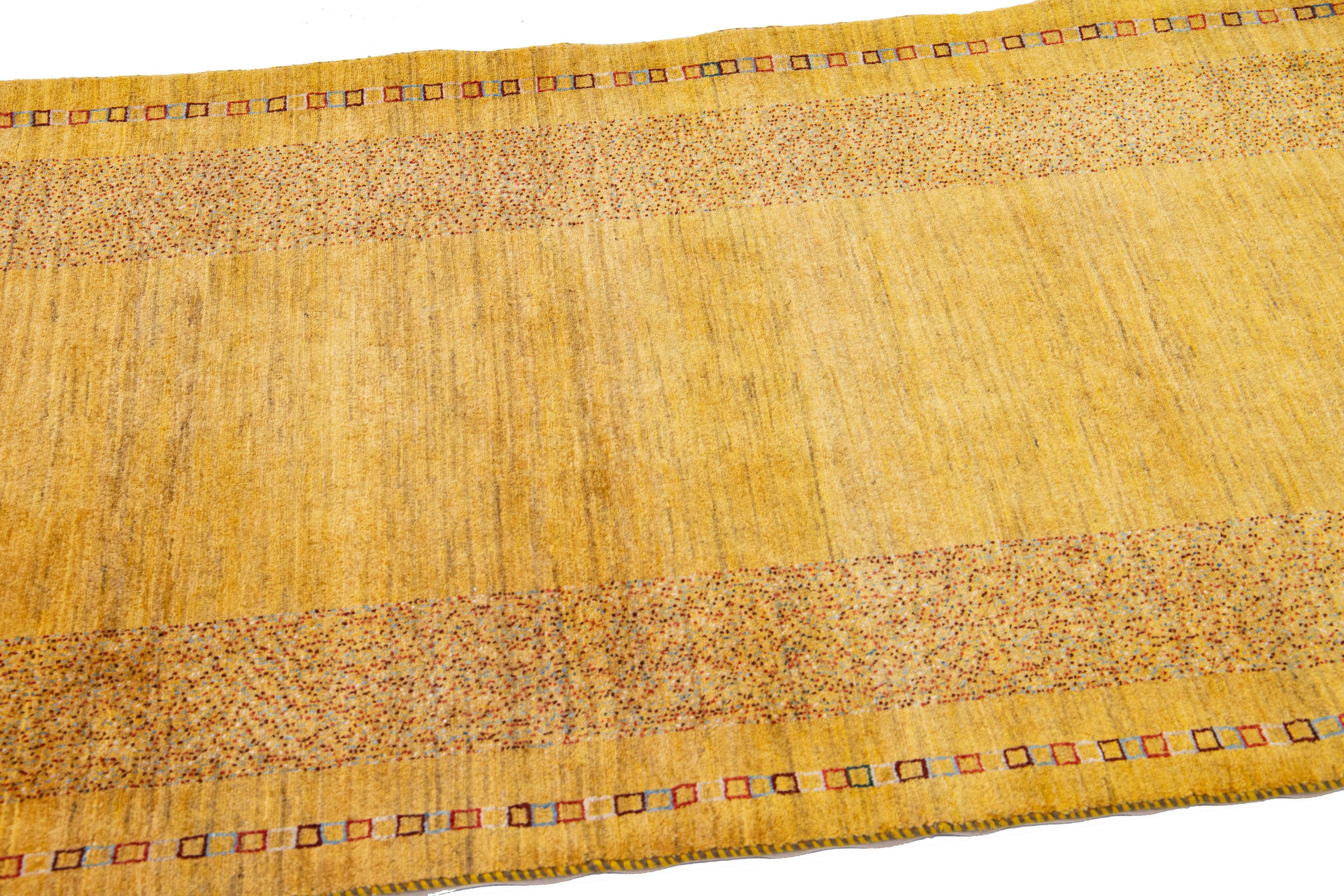 Hand-Woven Modern Persian Gabbeh Yellow Handmade Wool Rug with Geometric Pattern For Sale