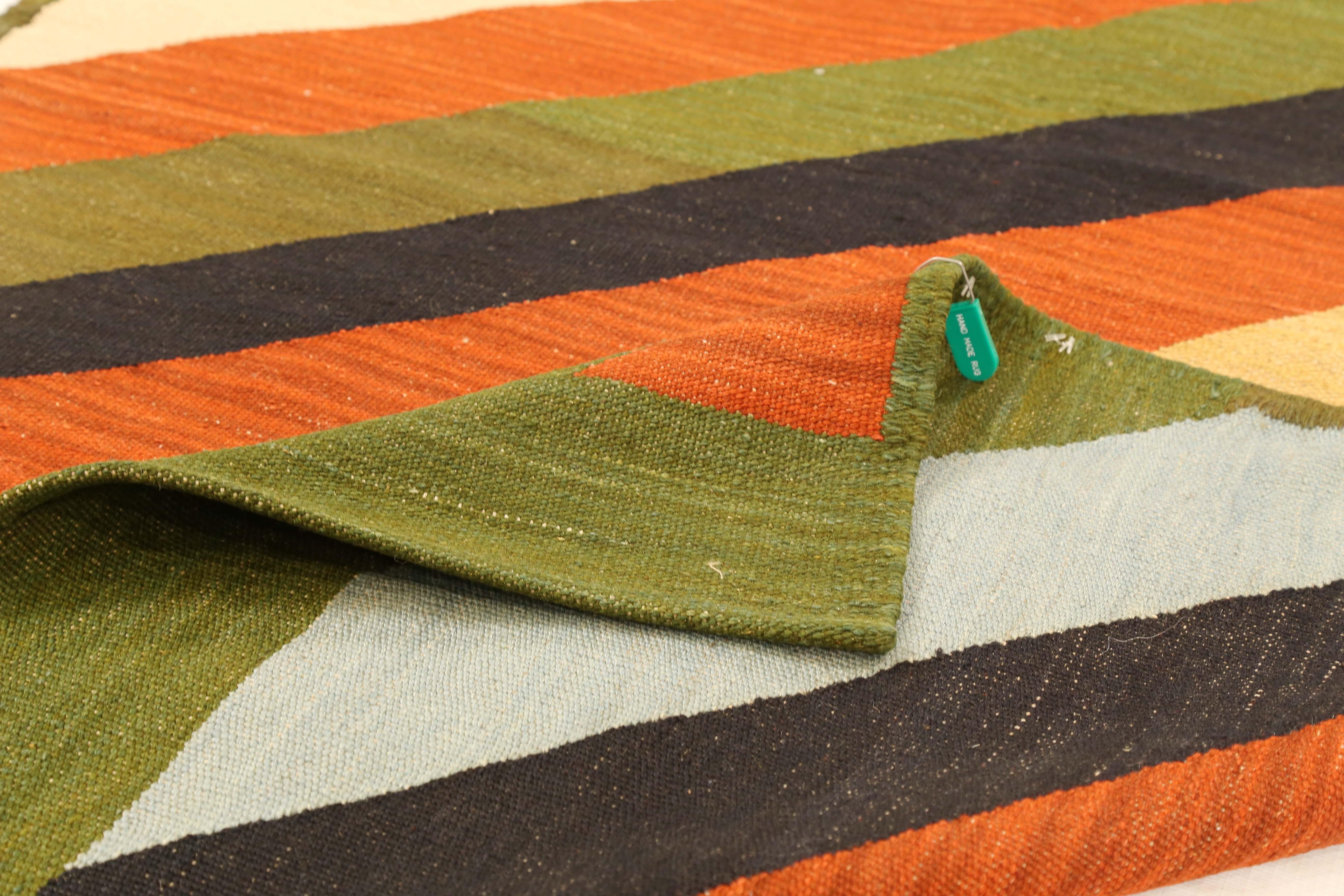 green kilim-style carpet