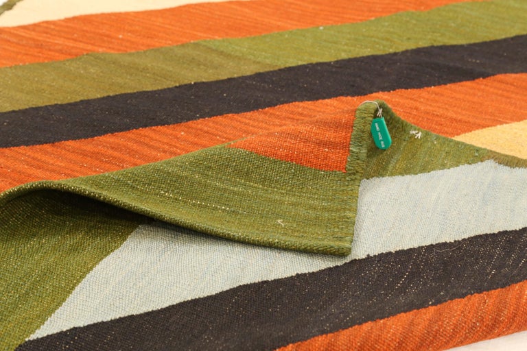 Modern Persian Kilim Style Rug with Diagonal Colored Stripes on Green