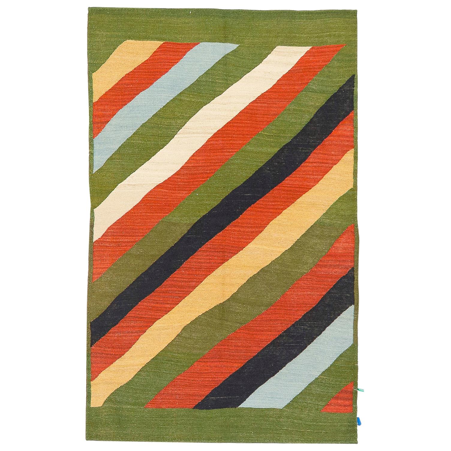 Modern Persian Kilim Style Rug with Diagonal Colored Stripes on Green Field For Sale