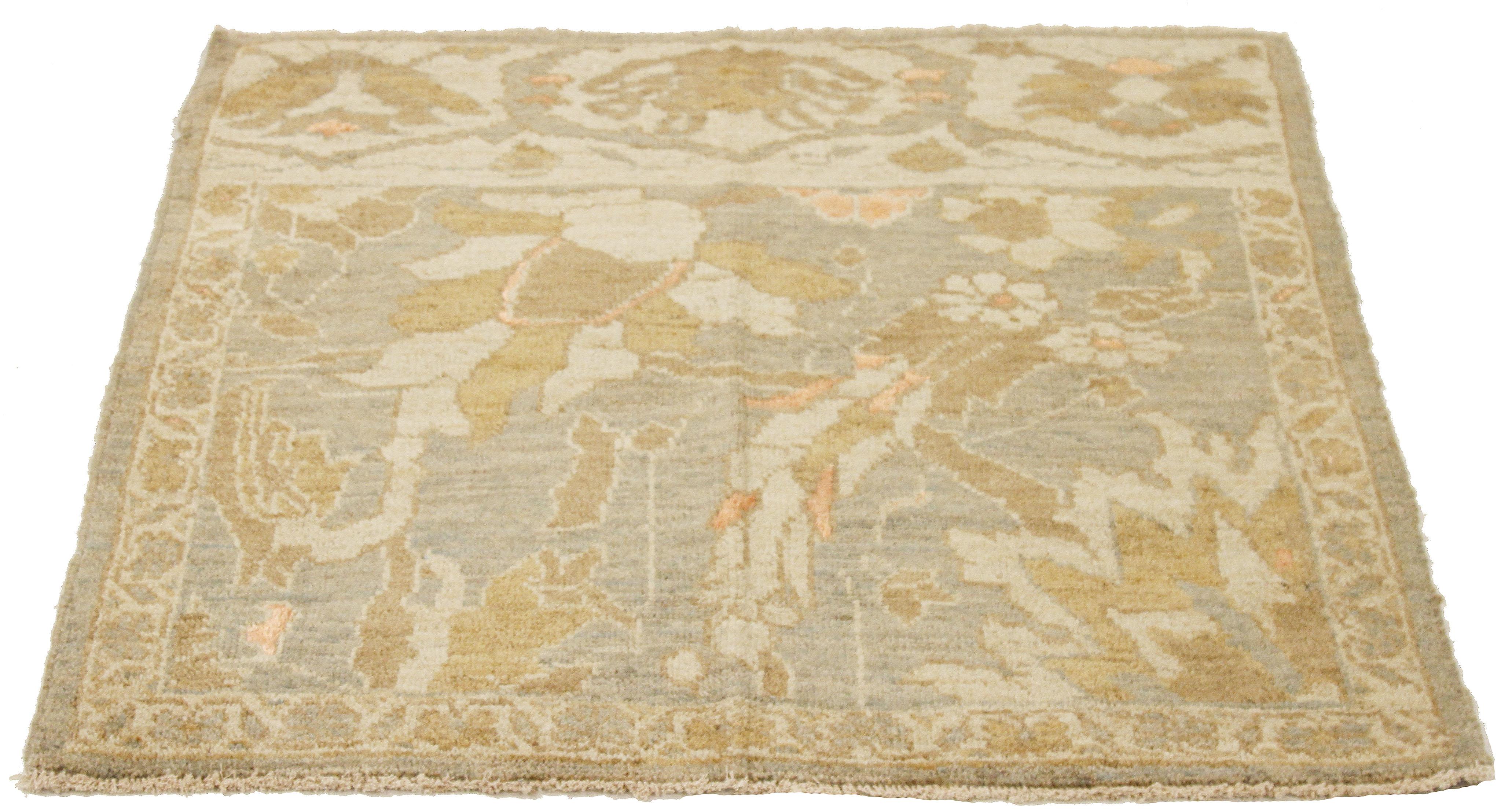 Modern handmade Persian area rug from high-quality sheep’s wool and colored with eco-friendly vegetable dyes that are proven safe for humans and pets alike. It’s a contemporary Sultanabad design showcasing a regal ivory field with prominent Herati