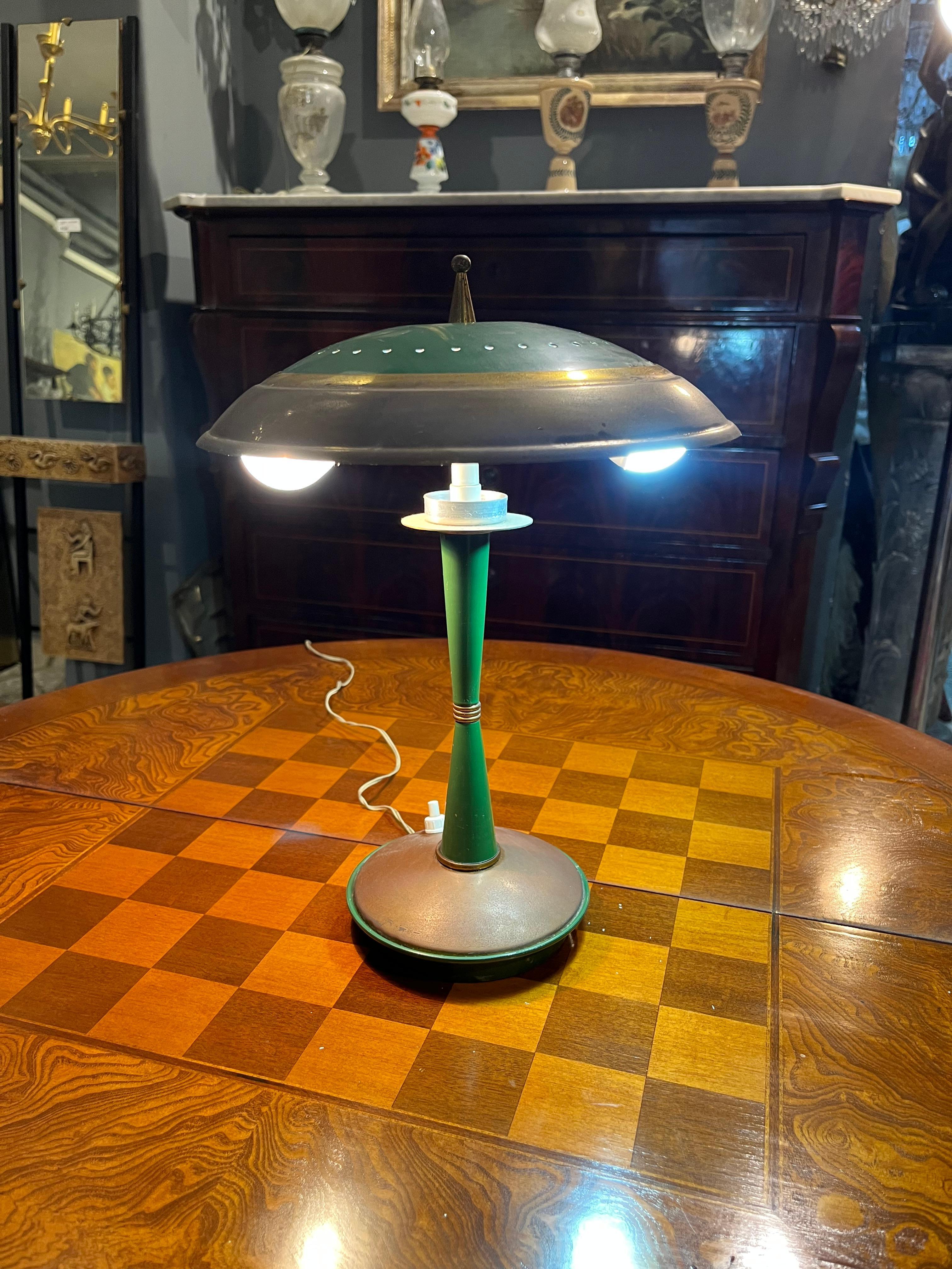 Modern petrol green table lamp from the 1960s. Product in good condition with small wear caused by age and use. Mid-century style refers to the middle of the last century, in particular the period between the 1940s and 1960s, immediately after the