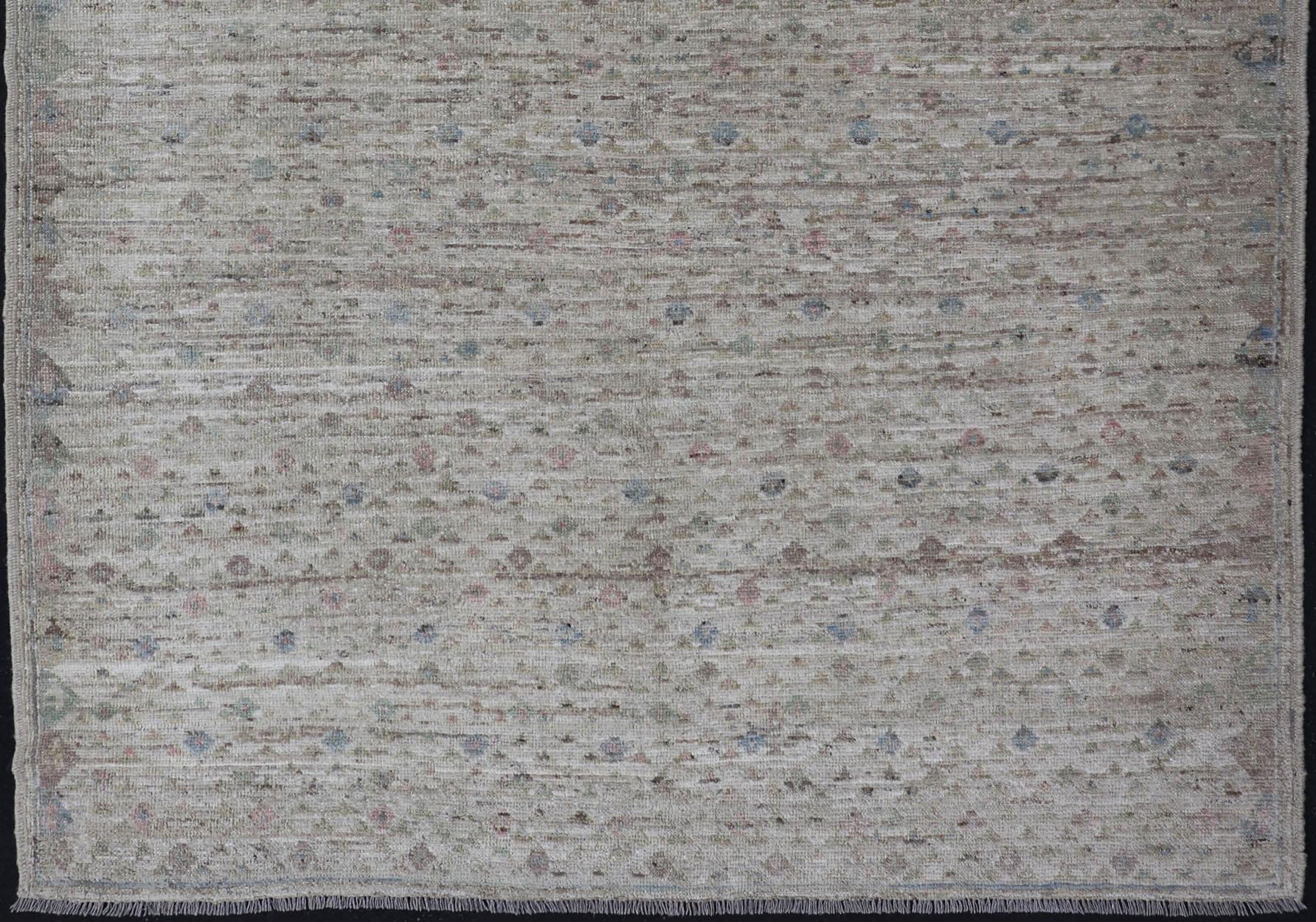 Hand-Knotted Modern Piled Rug with All-Over Design in Muted Colors and Cream Background For Sale
