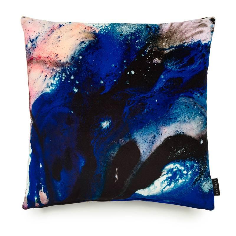 Beyond Nebulous pink and blue cotton velvet cushion by 17 Patterns (London, UK) is a sensual marbled design with subtle complementary tones and veins. The original painting was weathered in the open air to fuse the pigments with atmospheric changes.