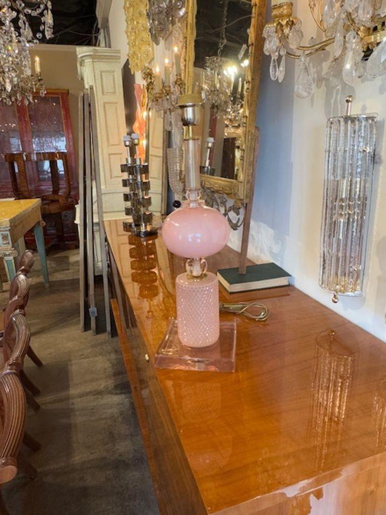 Experience the elegance and sophistication of the Modern Pink Murano Glass Component Lamp, a stunning addition to any interior space. The lamp's design features exquisite pink Murano glass, lending a touch of romance and luxury to your decor. Its