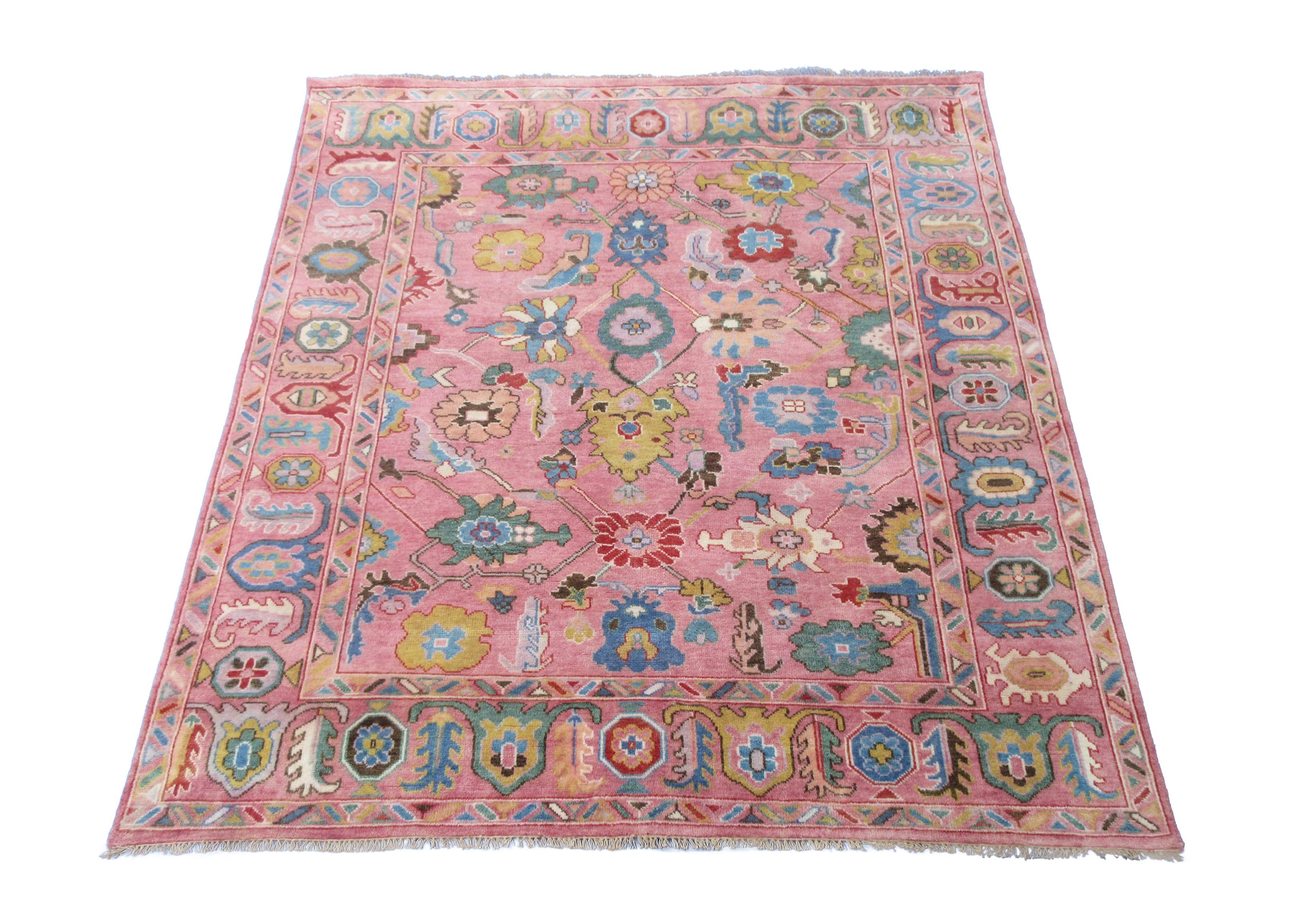 Hand knotted wool pile on a cotton foundation.

4' x 6'

New

Origin: India

Field Color: Pink

Border Color: Pink

Accent Color: Blue, Ivory, Brown, Red, Green.