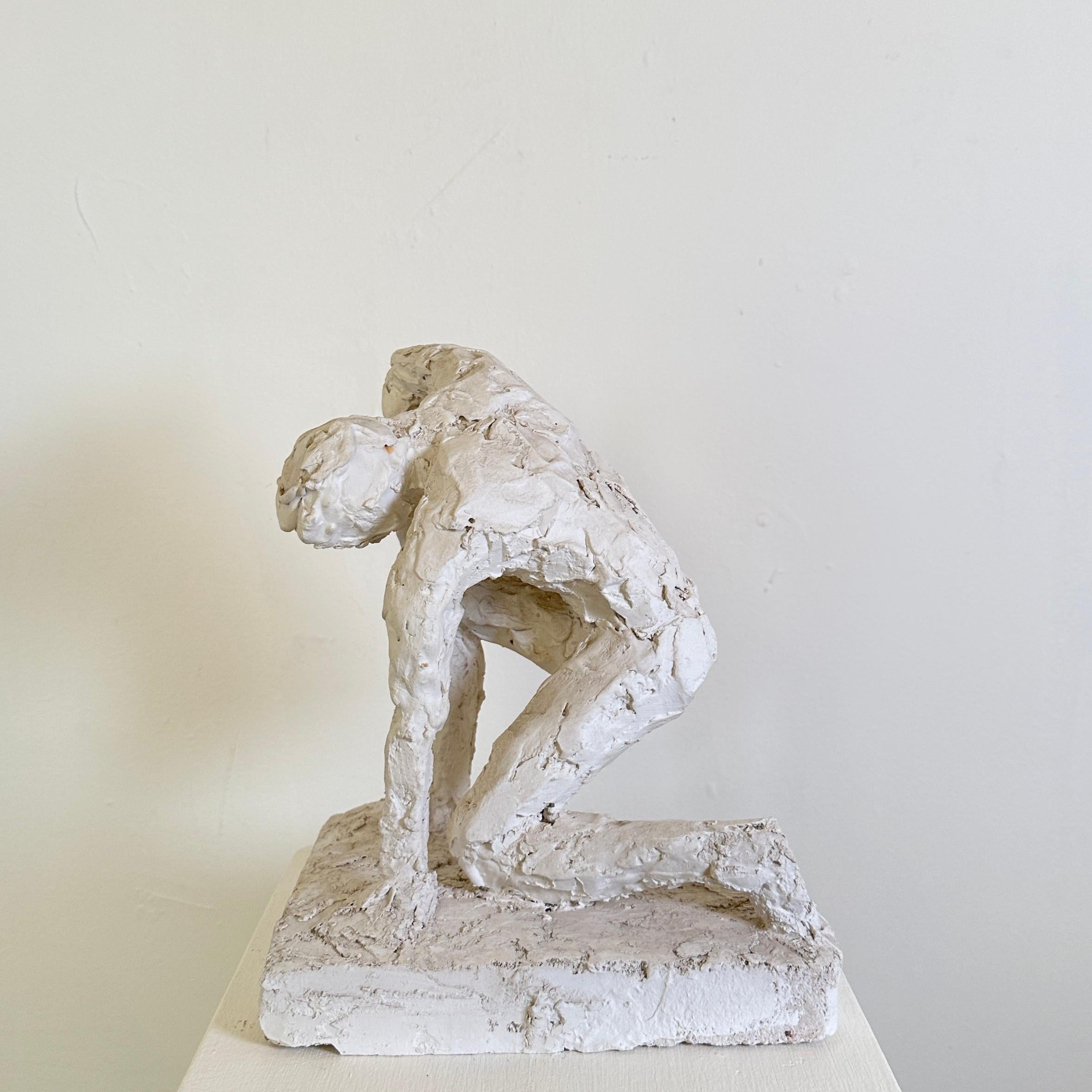 sculpture man kneeling woman