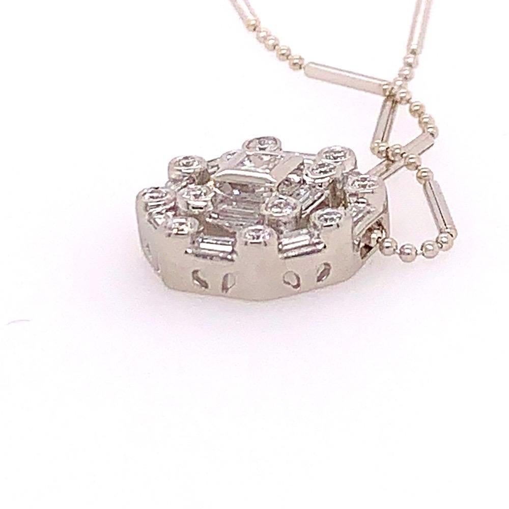 Modern Platinum 1.5 Carat Natural Round and Baguette Diamond Pendant, circa 1990 In Good Condition In Los Angeles, CA