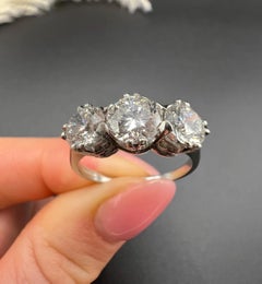 Modern Platinum, 2.35 Carat Diamond Three Stone Engagement Ring- GIA Certified