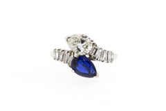 Modern Platinum Sapphire Diamond Bypass Ring