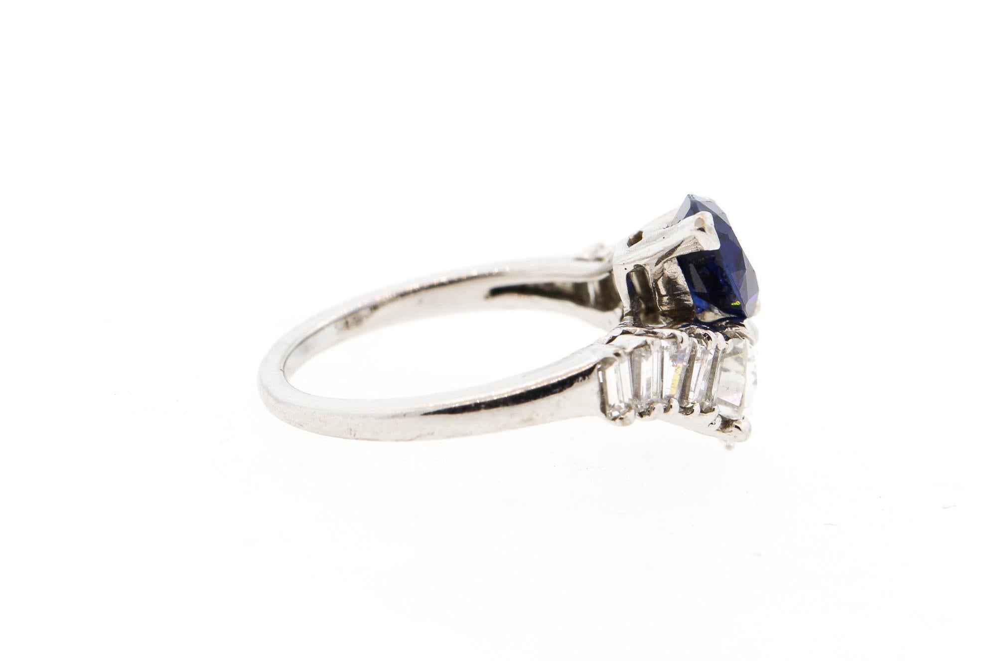 Modern Platinum Sapphire Diamond Bypass Ring In Good Condition In New York, NY