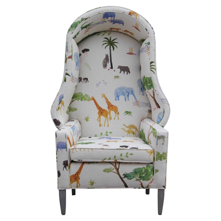 Gorgeous and unique porter's chair in the style of Baker or Dunbar and freshly upholstered in a fun safari animal print by Andrew Martin. Super comfortable and stylish.