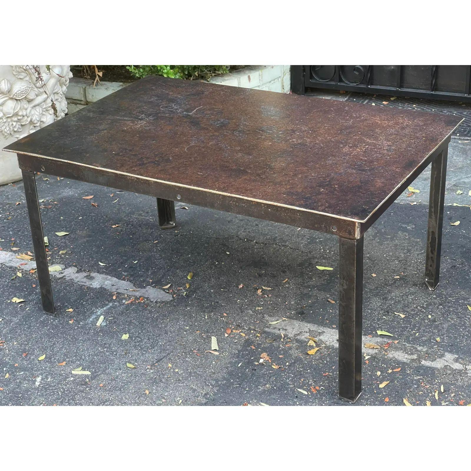 Modern Pounded Iron Industrial Chic Coffee Cocktail Table. Simple and elegant with a patinated finish.

Additional information: 
Materials: Iron
Color: dark bronze
Period: 1990s
Styles: Industrial, Modern
Table Shape: Rectangle
Item Type: Vintage,