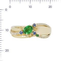 Anello moderno in oro giallo e zaffiro blu con diamante prezioso e tsavorite