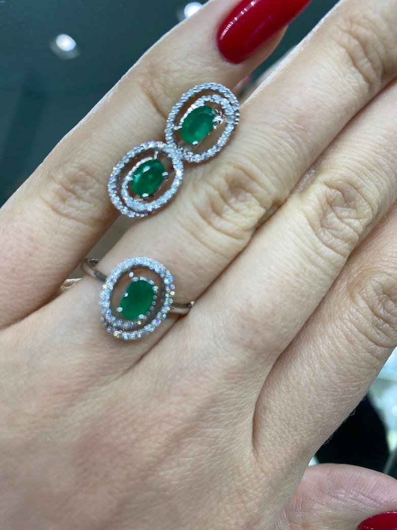 Ring White Gold 14 K (Matching Earring Available)
Diamond 31-Round 57-0,18ct-4/6A
Emerald 1-Oval-0,43ct 3/(5)ЗA
Weight 1.47 grams
Size 17.5

With a heritage of ancient fine Swiss jewelry traditions, NATKINA is a Geneva based jewellery brand, which