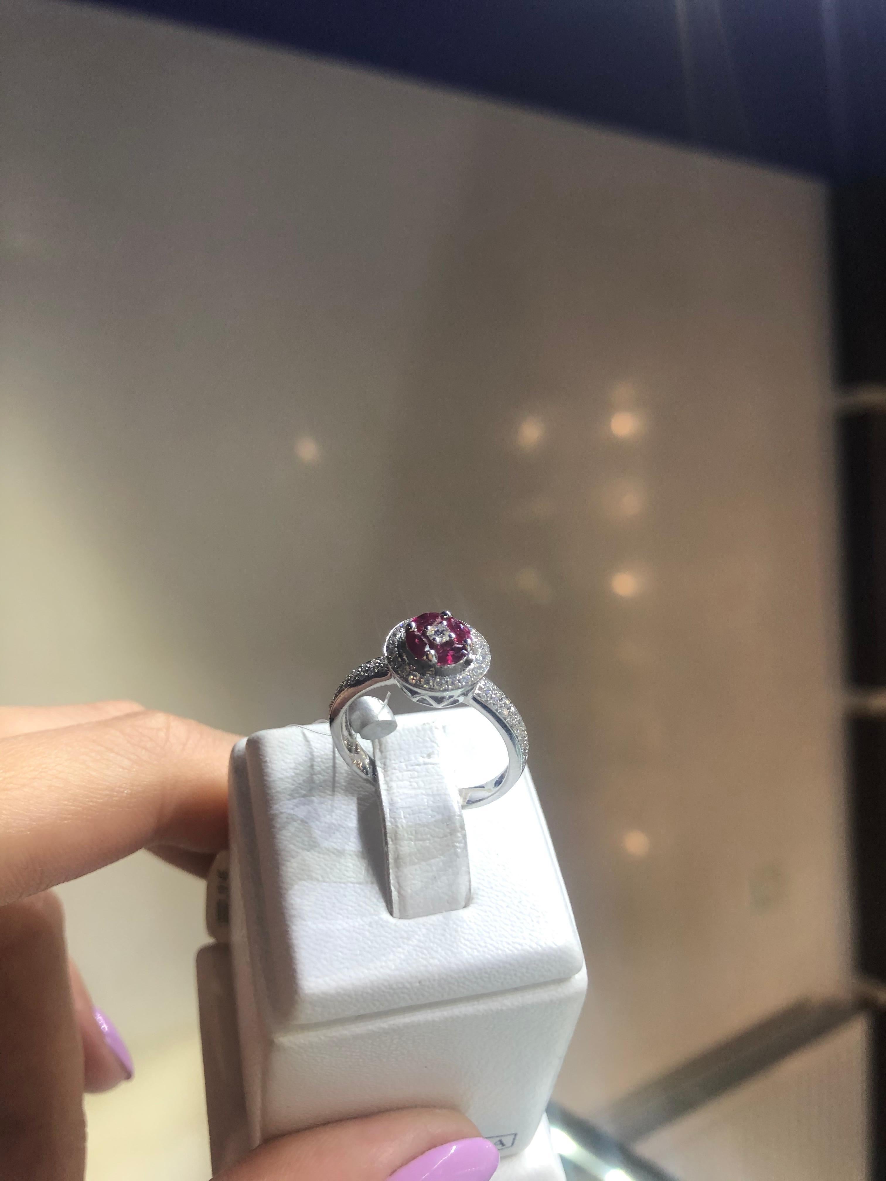 Ring White Gold 14 K (Matching Earrings Available)
Diamond 40-Round 57-0,21ct-4/5A
Ruby 10-25-0,6ct Т(4)/4
Weight 2.26 grams
Size 17 (Adjustable)  


With a heritage of ancient fine Swiss jewelry traditions, NATKINA is a Geneva based jewellery