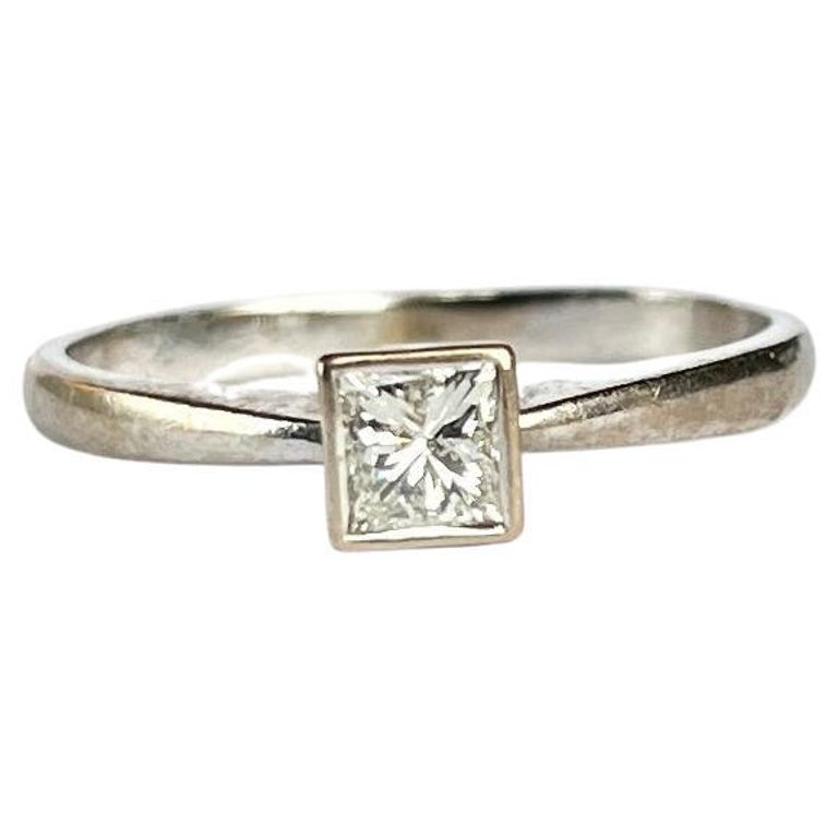 A fine princess cut solitaire diamond ring