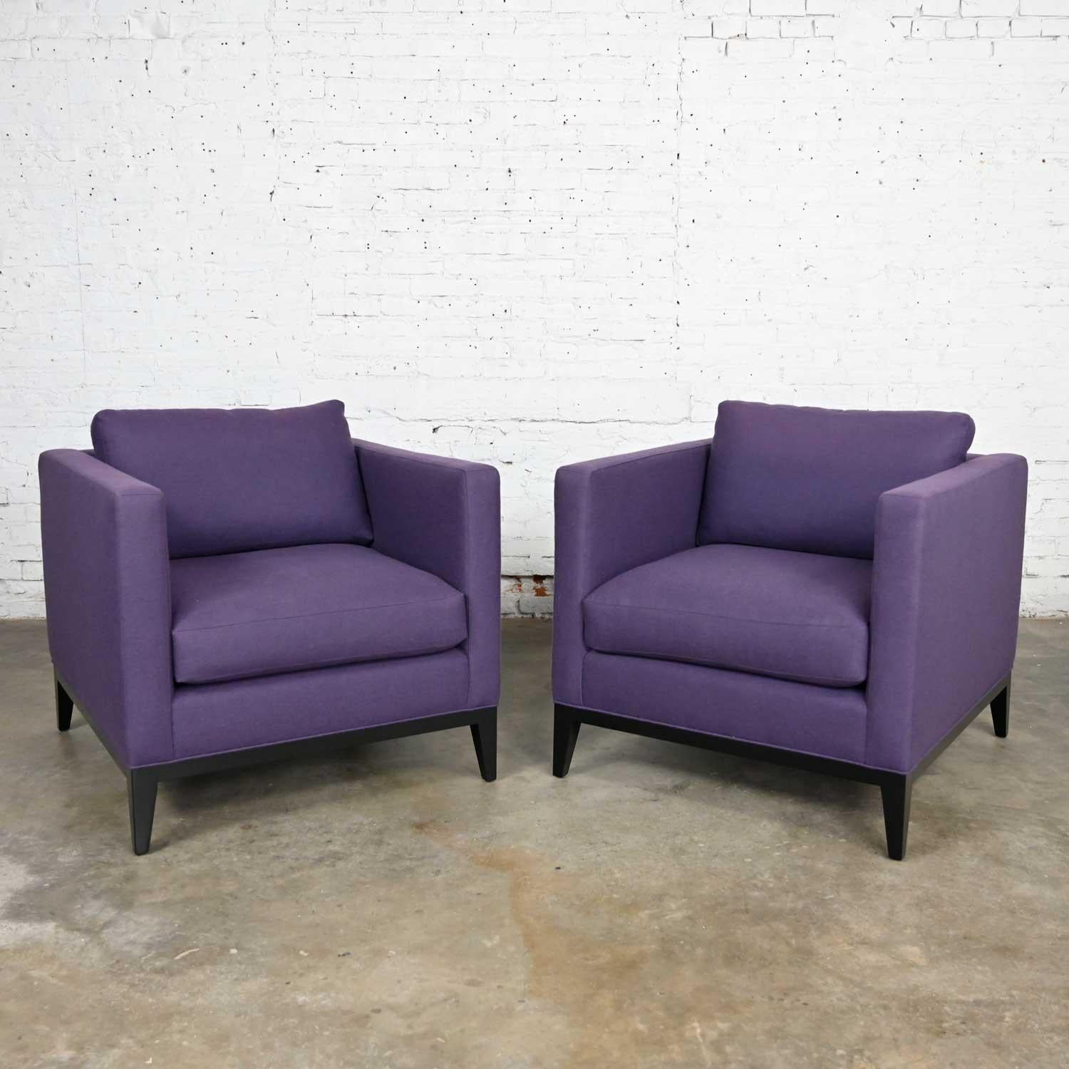 Splendid modern purple plum tone tuxedo style club chairs by Baker a pair. Comprised of loose back & seat cushions with polyester fill & feather down wrap, wool-like plum fabric, & a wood base & legs. Beautiful condition, keeping in mind that these