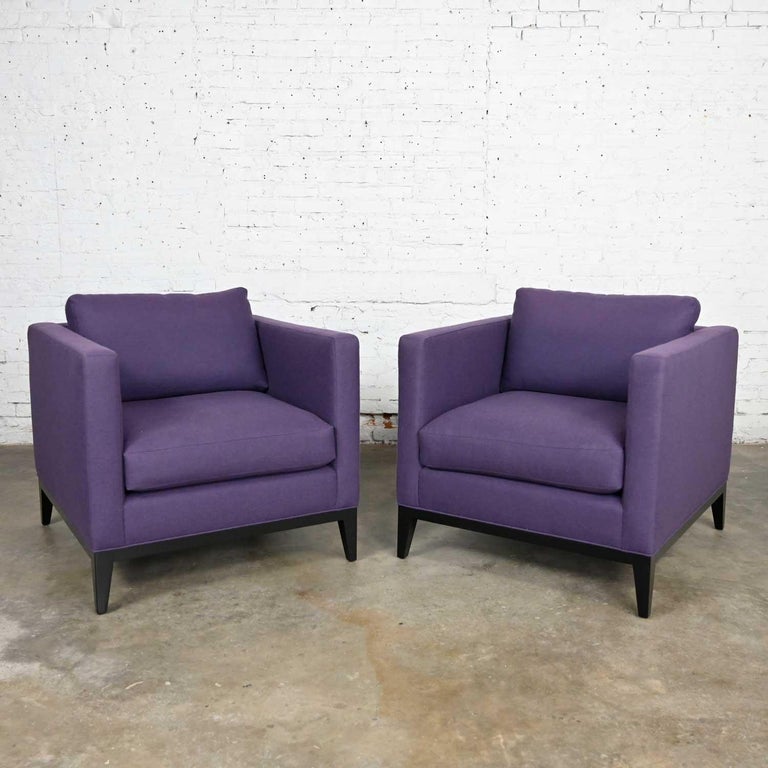Splendid modern purple plum tone tuxedo style club chairs by Baker a pair. Comprised of loose back & seat cushions with polyester fill & feather down wrap, wool-like plum fabric, & a wood base & legs. Beautiful condition, keeping in mind that these