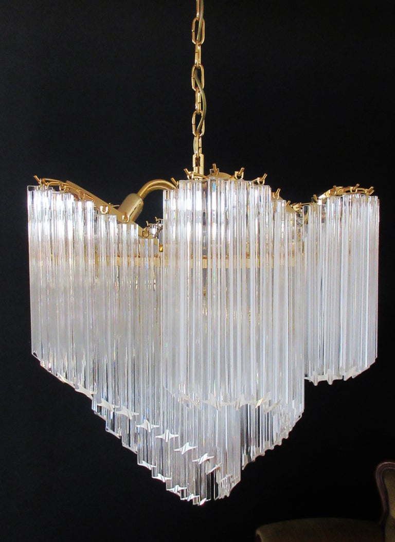 A magnificent Murano glass unique chandelier, spiral shape, very elegant, 114 quadriedri on gold metal frame. This large midcentury Italian chandelier is truly a timeless Classic.
Period: late 20th century
Dimensions: 51.20 inches (130 cm) height