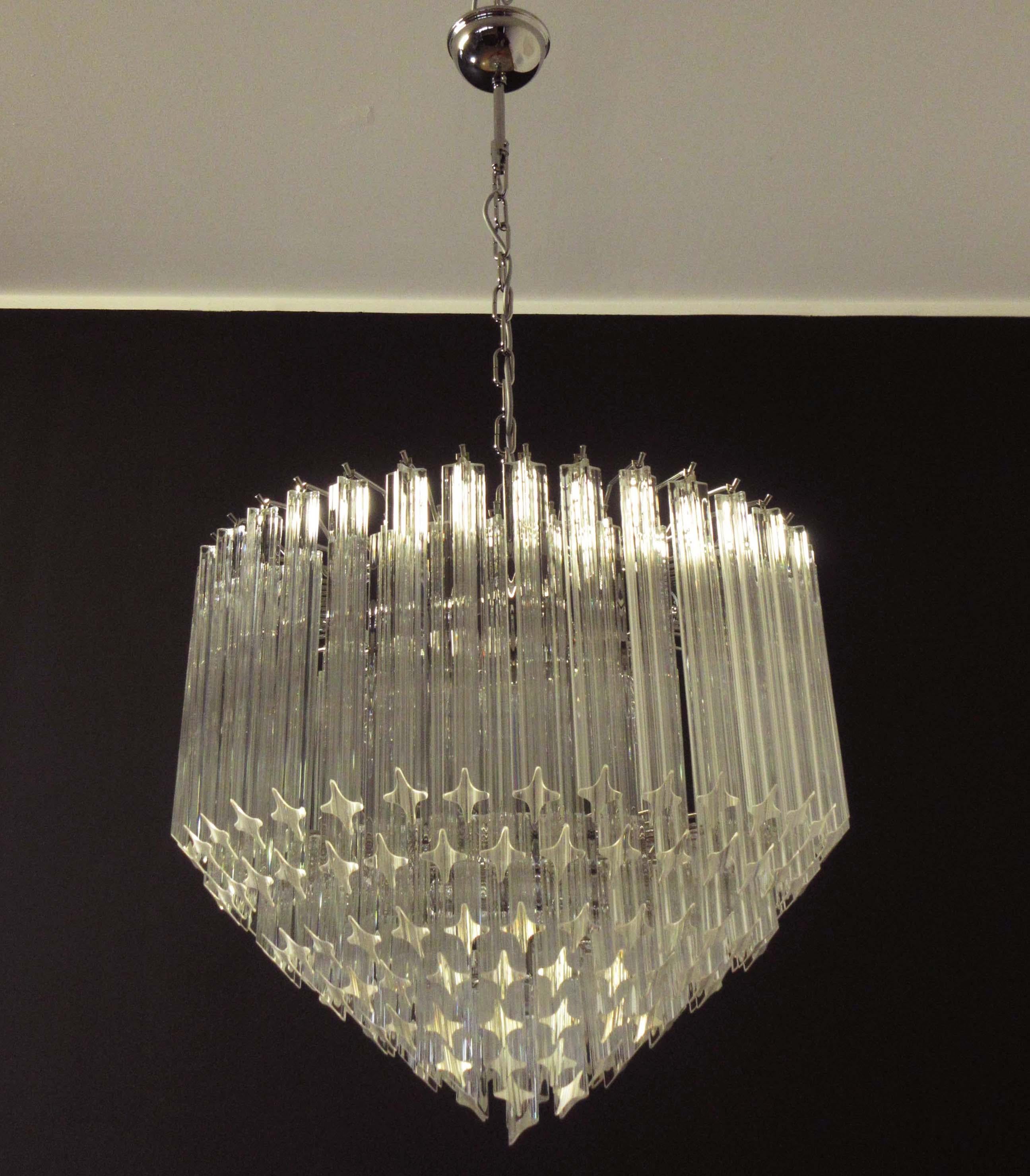 A magnificent Murano glass chandelier, 163 quadriedri on nickel metal frame. This large midcentury Italian chandelier is truly a timeless classic.
Period: late 20th century
Dimensions: 47.20 inches (120 cm) height with chain; 25.60 inches (65 cm)
