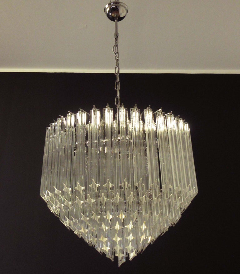 A magnificent Murano glass chandelier, 163 quadriedri on nickel metal frame. This large midcentury Italian chandelier is truly a timeless classic.
Period: late 20th century
Dimensions: 47.20 inches (120 cm) height with chain; 25.60 inches (65 cm)