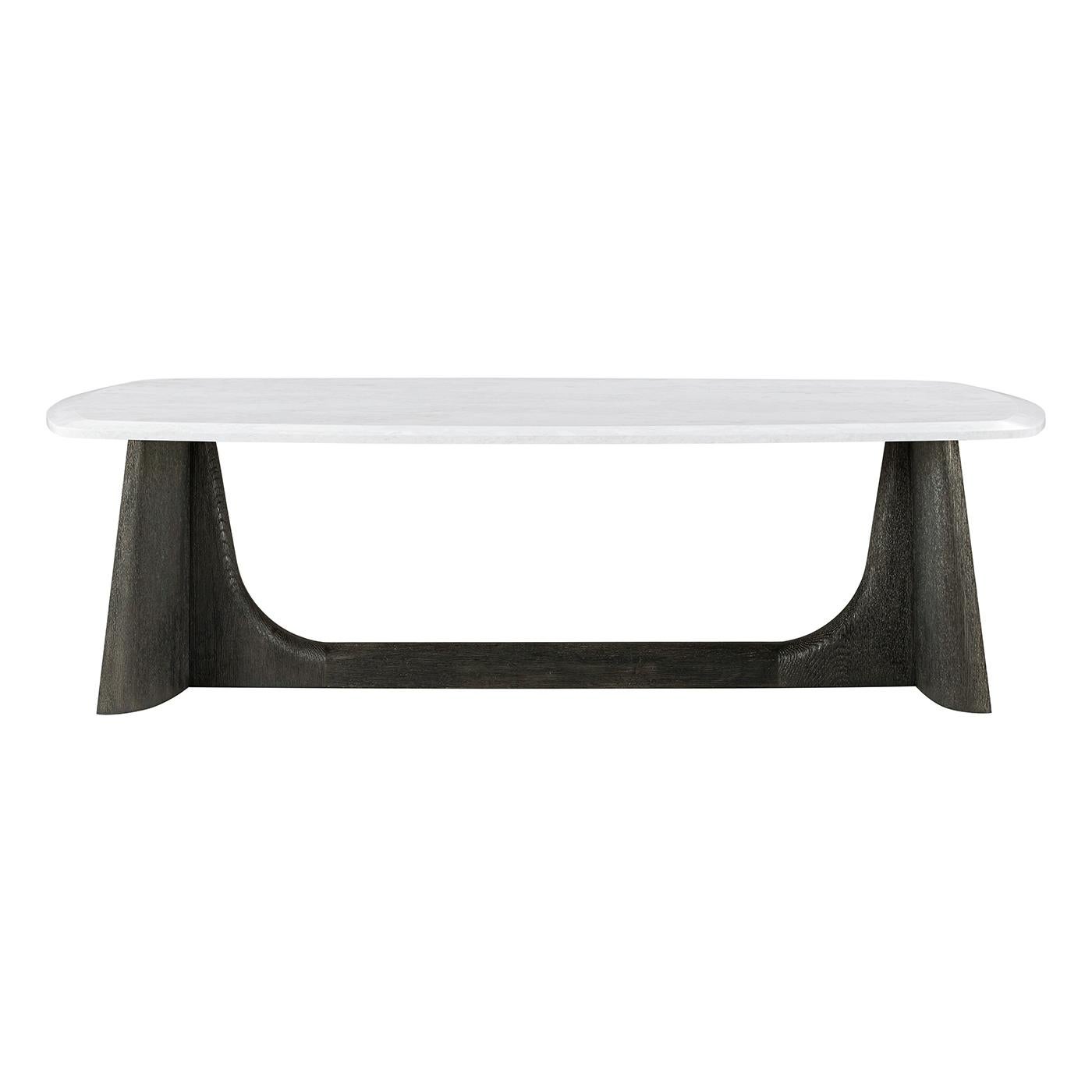 Whiting avec un plateau en quartz blanc à bord biseauté reposant carrément sur une solide base à tréteaux de style trapézoïdal. Finition en chêne anthracite foncé aux extrémités et au long châssis. 
Dimensions : 55