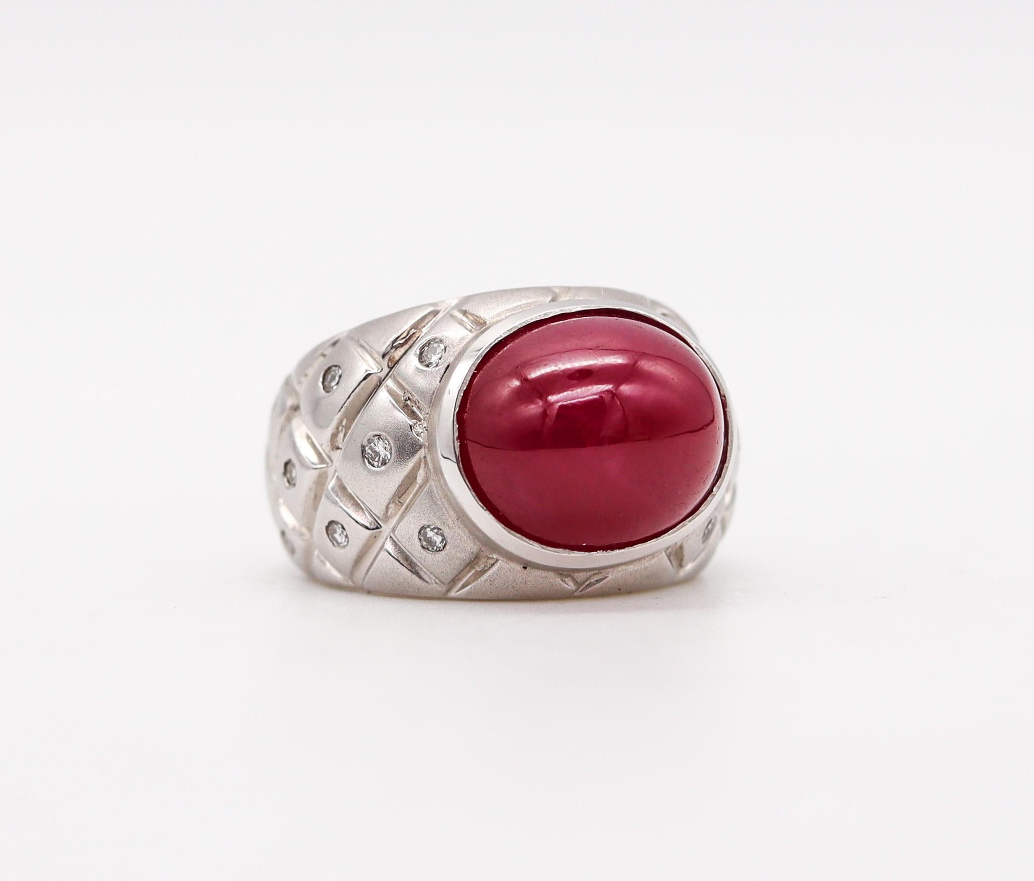 Modern quilted cocktail ring with gemstones

Very handsome Italian piece, crafted with a quilted patterns in solid white gold of 18 karats and finished with semi-frosted and polished surfaces.

The top is suited with a bezel that is holding an oval