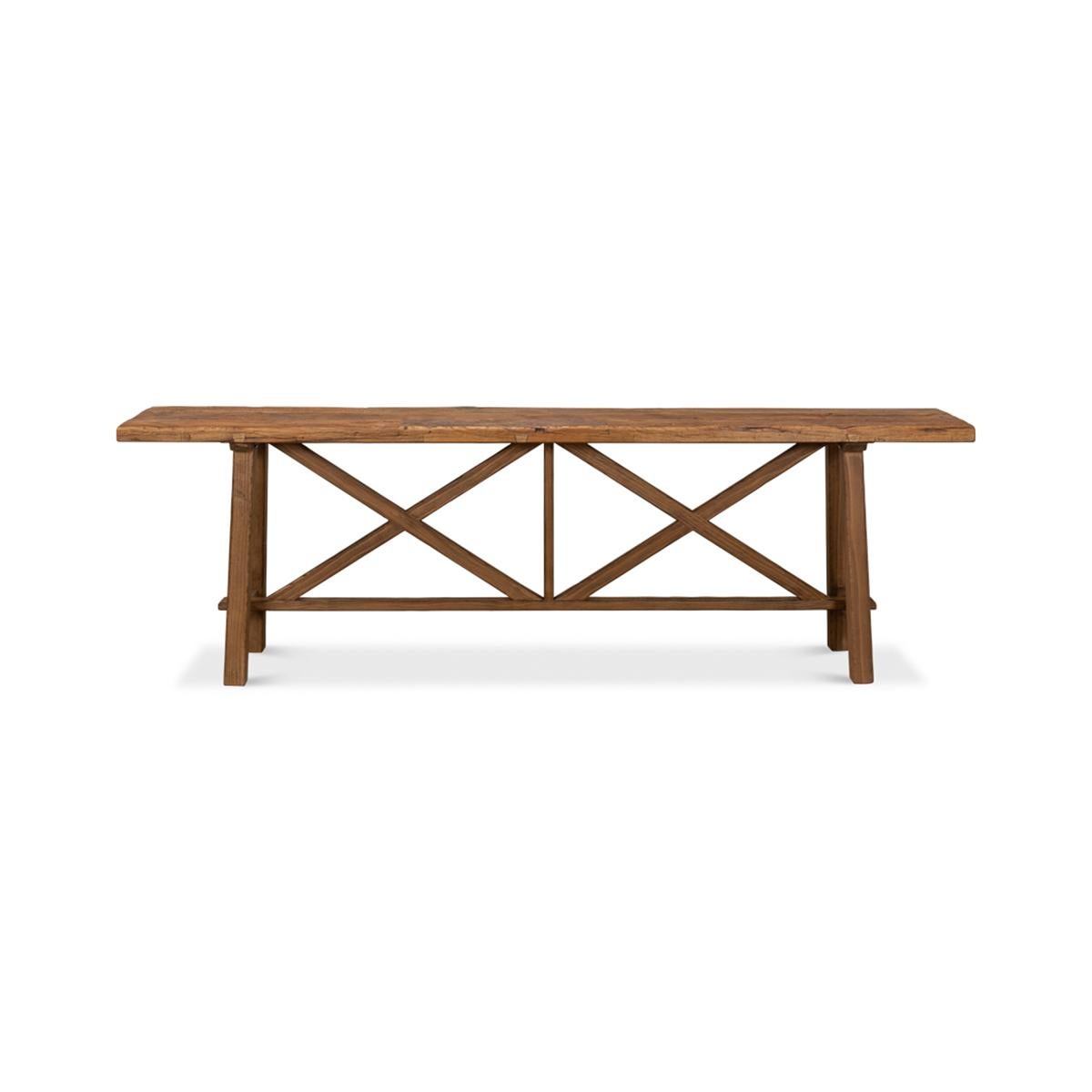 A modern reclaimed wood console table. A truly unique piece crafted from 100-year-old floorboards. The reclaimed top sits on a pine base with a double x design. 

Dimensions: 93
