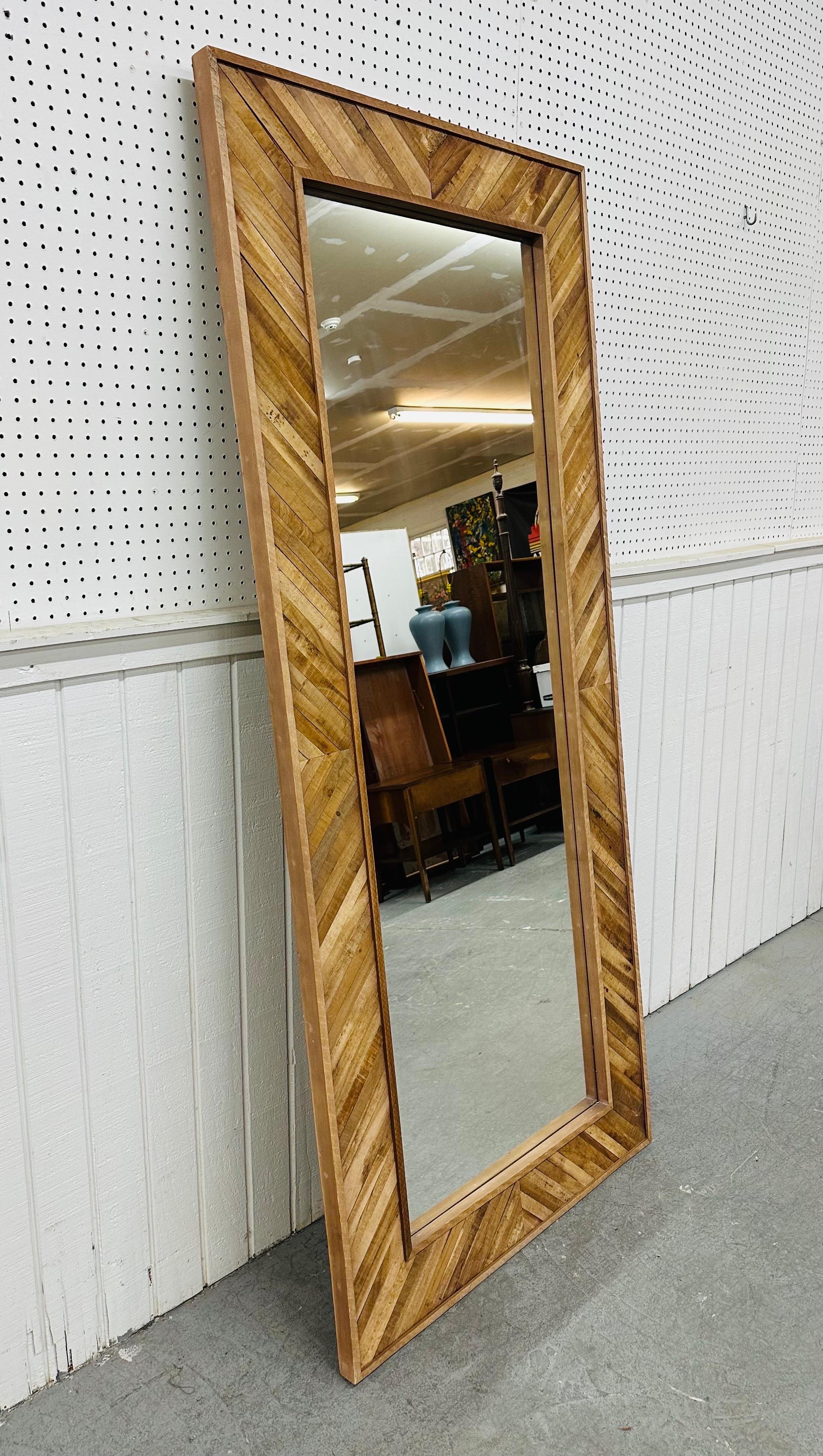 This listing is for a Modern Reclaimed Wooden Floor Mirror. Featuring a straight line design, rectangular reclaimed wood frame, centered mirror, and hooks on the back for hanging. This is an exceptional combination of quality and design!