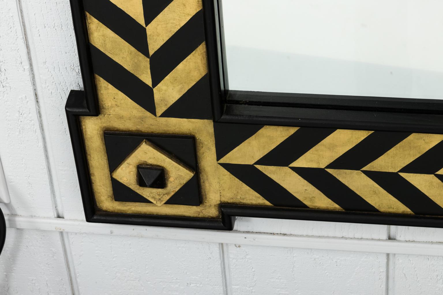 Modern painted mirror with black and ivory chevron pattern, from the estate of Arnold Scasiof Parker Ladd, Palm Beach, Florida, circa 1980s.
 