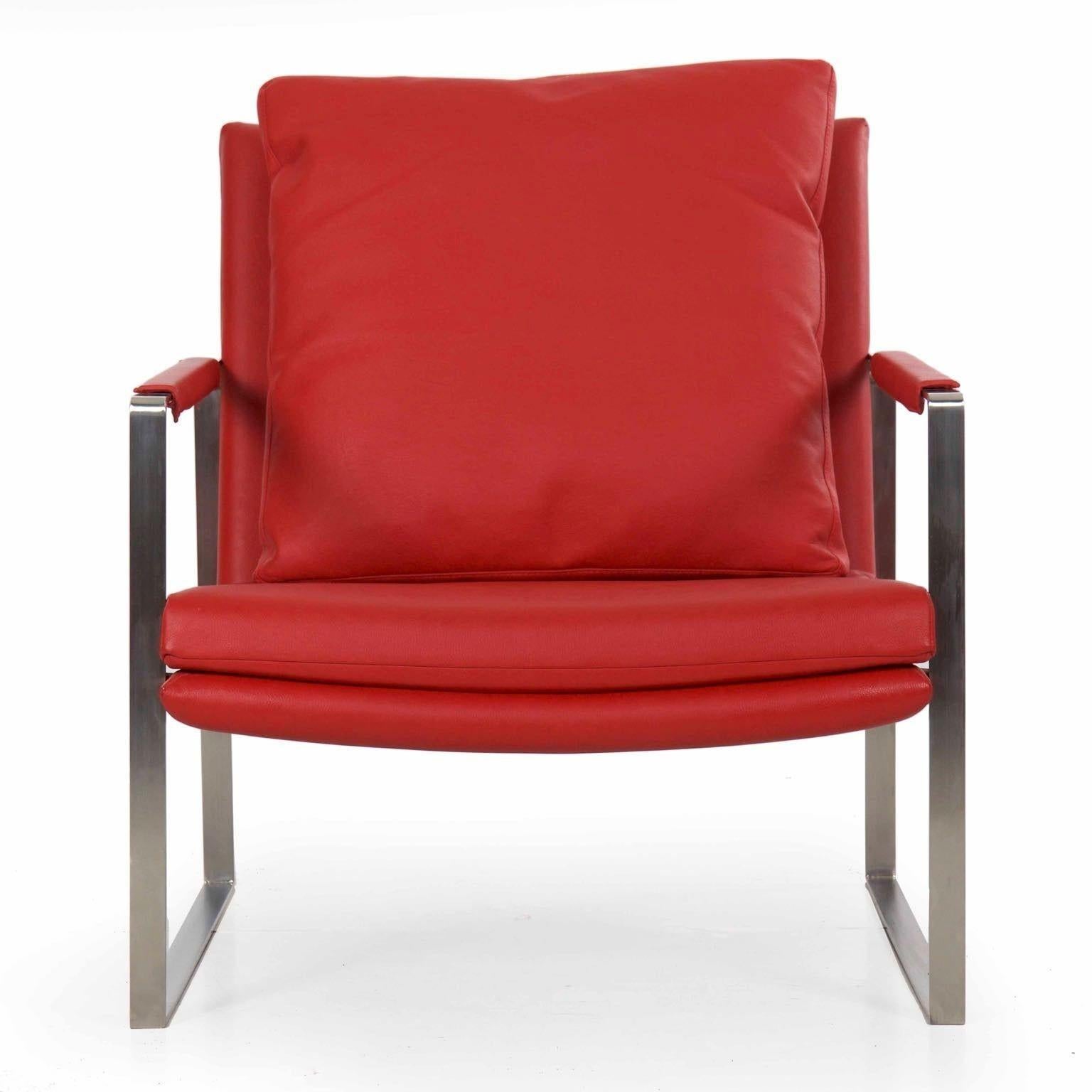 MODERN BRUSHED STEEL CUBE LOUNGE CHAIR
In recent red naughahyde, circa late 20th century
Item # 803WBP15 

This is a very high quality modern lounge chair crafted of welded brushed flatbar steel in cube form.  Distinctly reminiscent of the designs