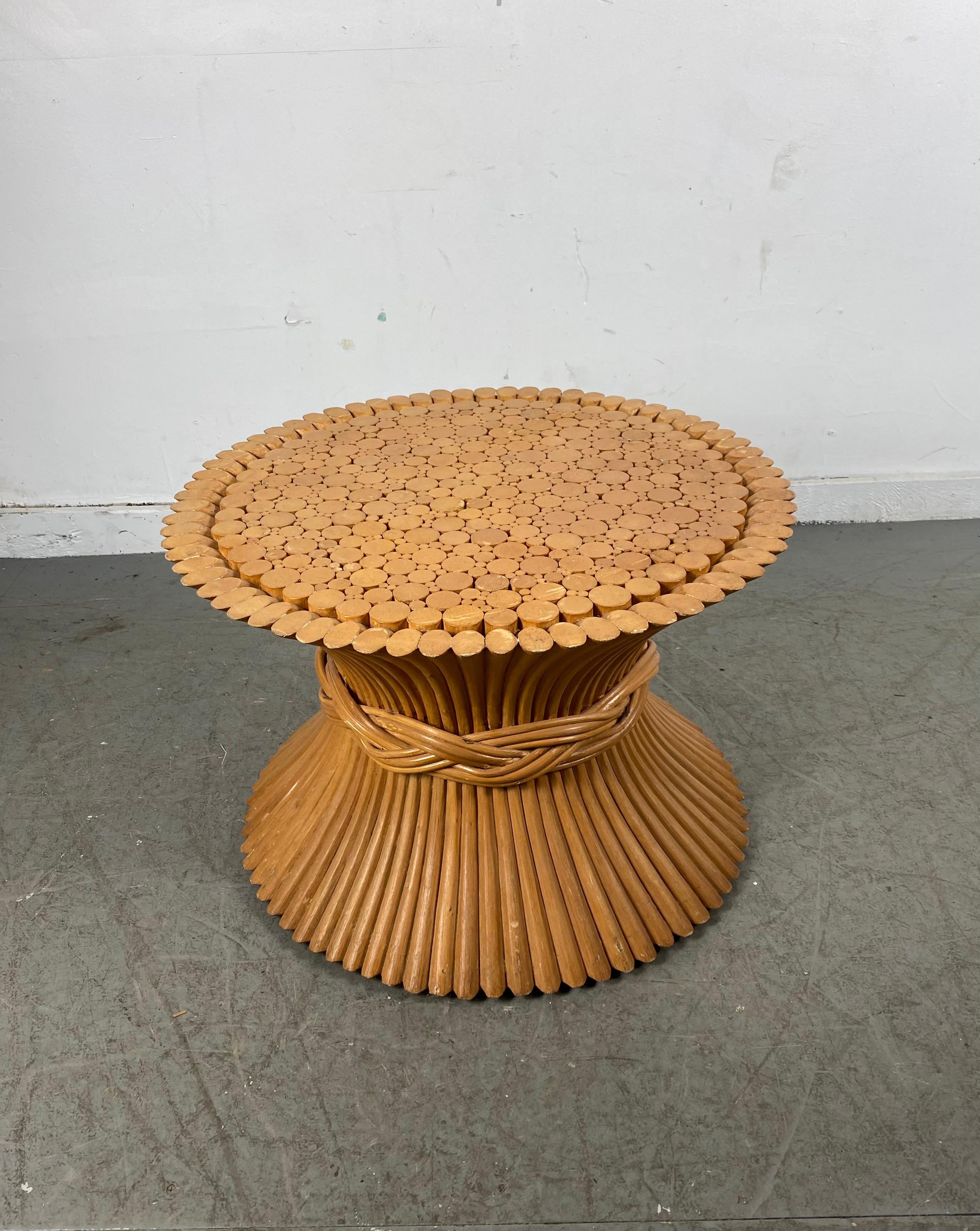 Classic Mid Century Modernist, Hollywood Regency occasional table by McGuire of San Francisco. Beautiful bundle of wheat form constructed of bamboo, minor scratches to top. Please check additional listings for coffee table, dining table and end