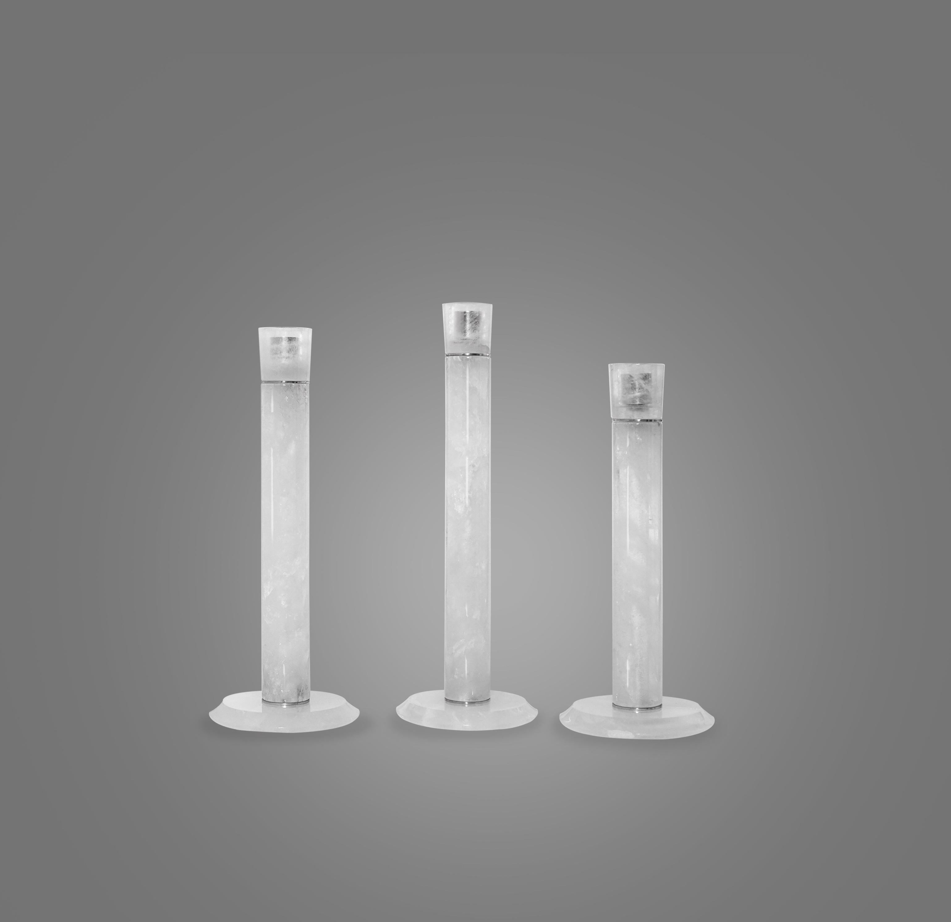 Group of three modern rock crystal candleholders in various height. Created by Phoenix Gallery, NYC.
Custom size, and quantity upon request.
Measures: 13.25