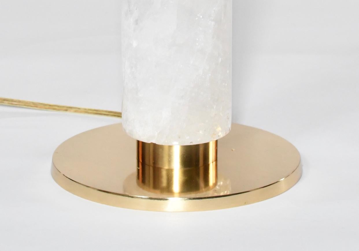 A fine carved cylindrical form of rock crystal quartz lamp with polished brass base. Available in antique brass finish and nickel-plating, created by Phoenix Gallery, NYC.
To the rock crystal: 15