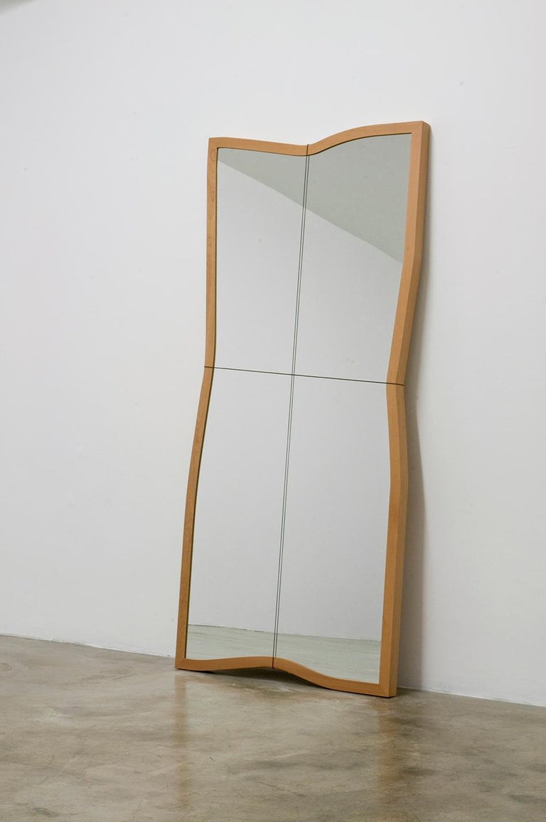 Mirror VI of the limited collection: IX mirrors. Rectangular framed mirror for Dilmos Milano in which narratives have been introduced. The reflection of the spectator is no longer objective, containing more than a reflection and the functional