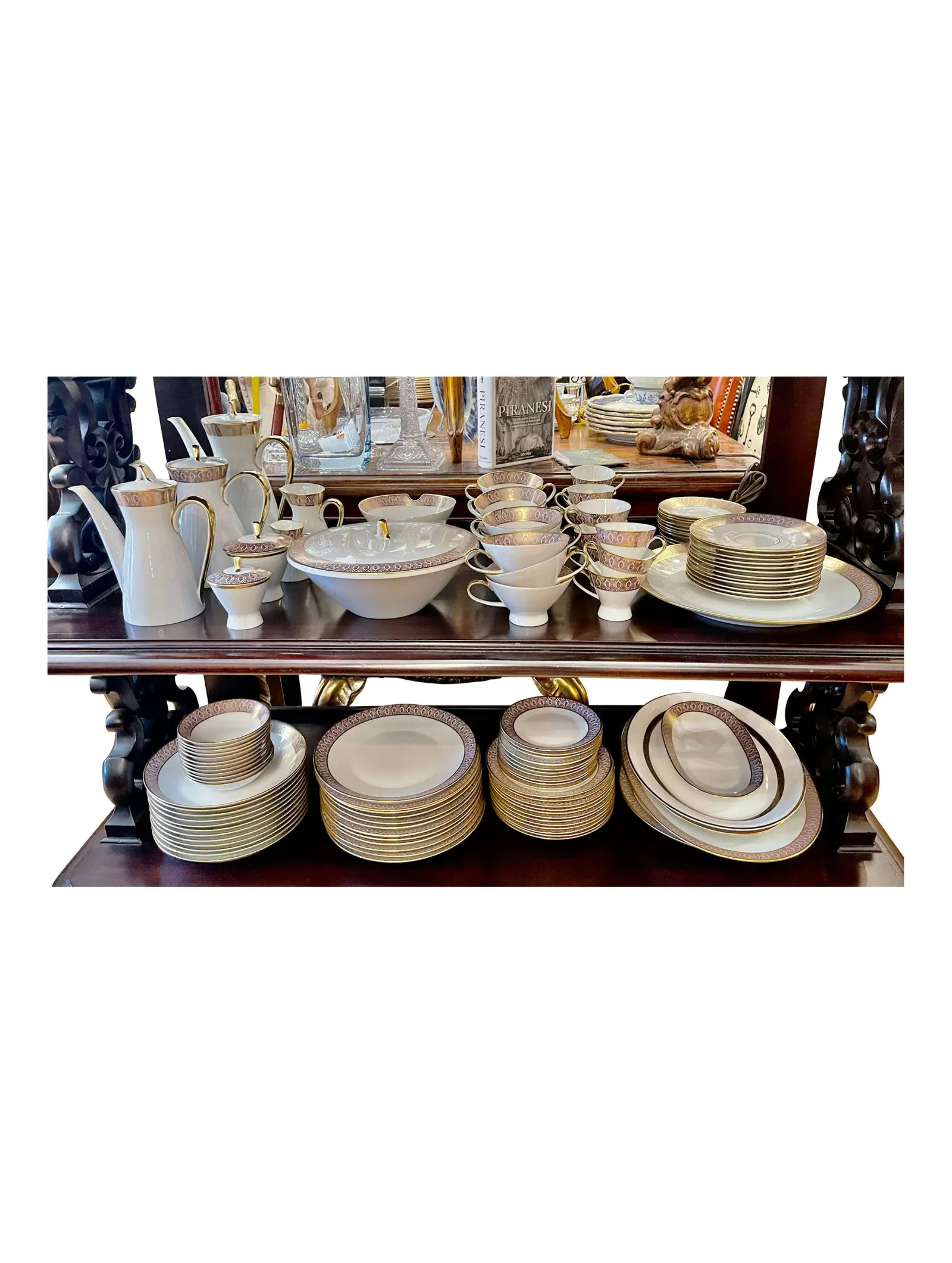 Art Deco Mid Century Modern Rosenthal Continental Pink & Gold Porcelain Dinnerware Massive Set
12 dinner plates
12 shallow bowls
12 salad plates
12 berry bowls
11 bread plates
12 teacups
12 teacup saucers
12 demitasse cups
12 demitasse