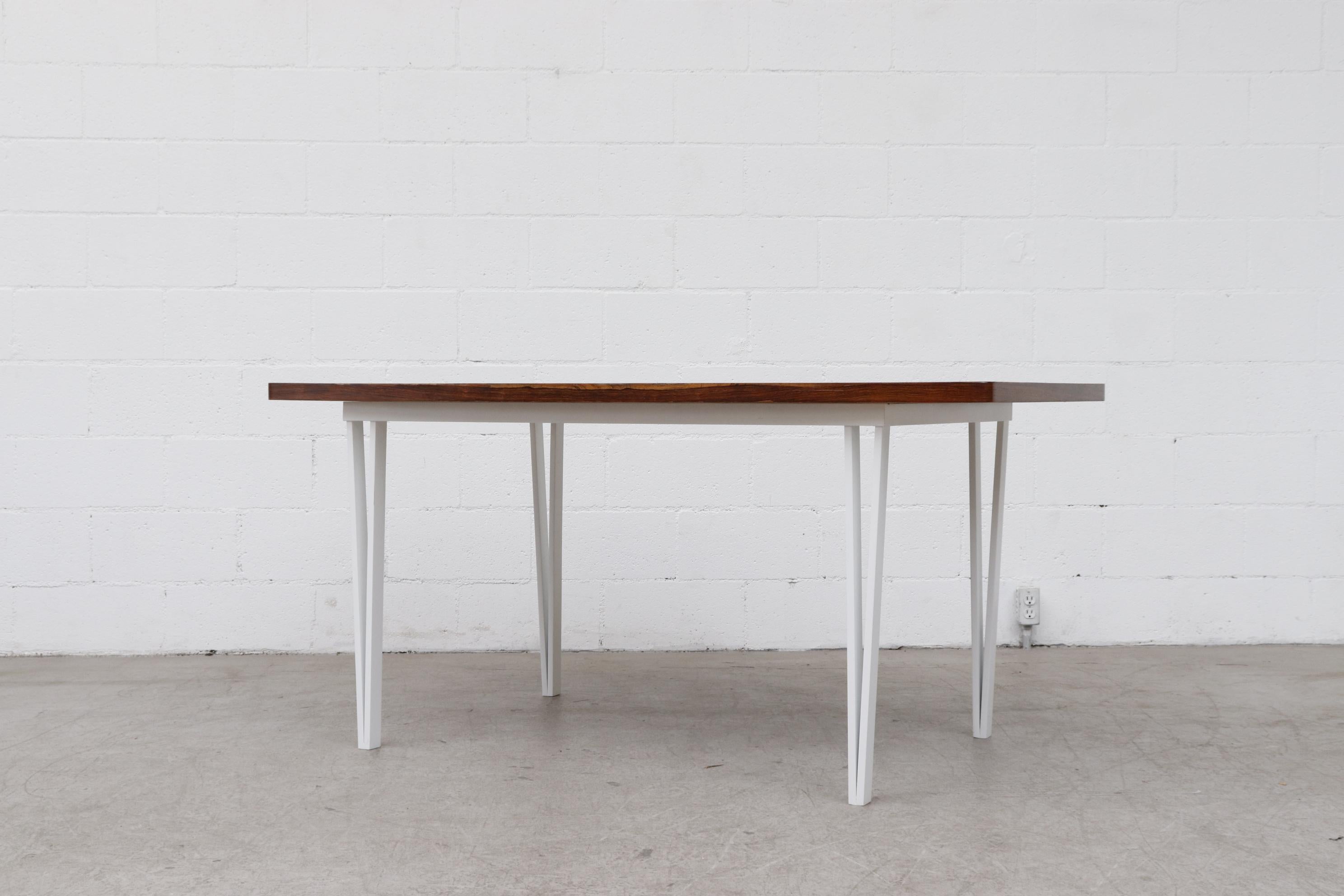 wood table with white metal legs