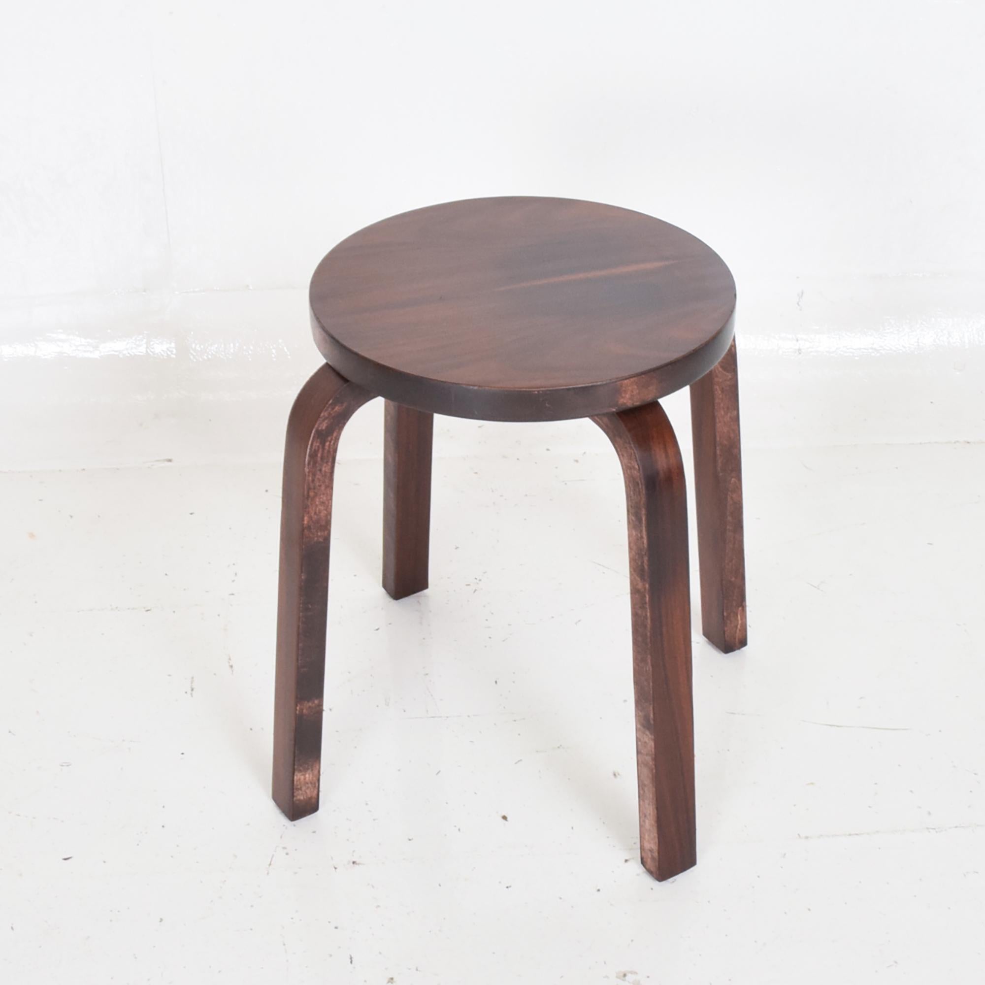 Rosewood low stool E60 iconic design by Alvar Aalto for Artek, Denmark, 1980s
Scandinavian Modern Classic in rosewood 4 leg stool (or useful as small side table) by Alvar Aalto for Artek.
Rich rosewood grain
Dimensions: 13.75 diameter x 19 tall.