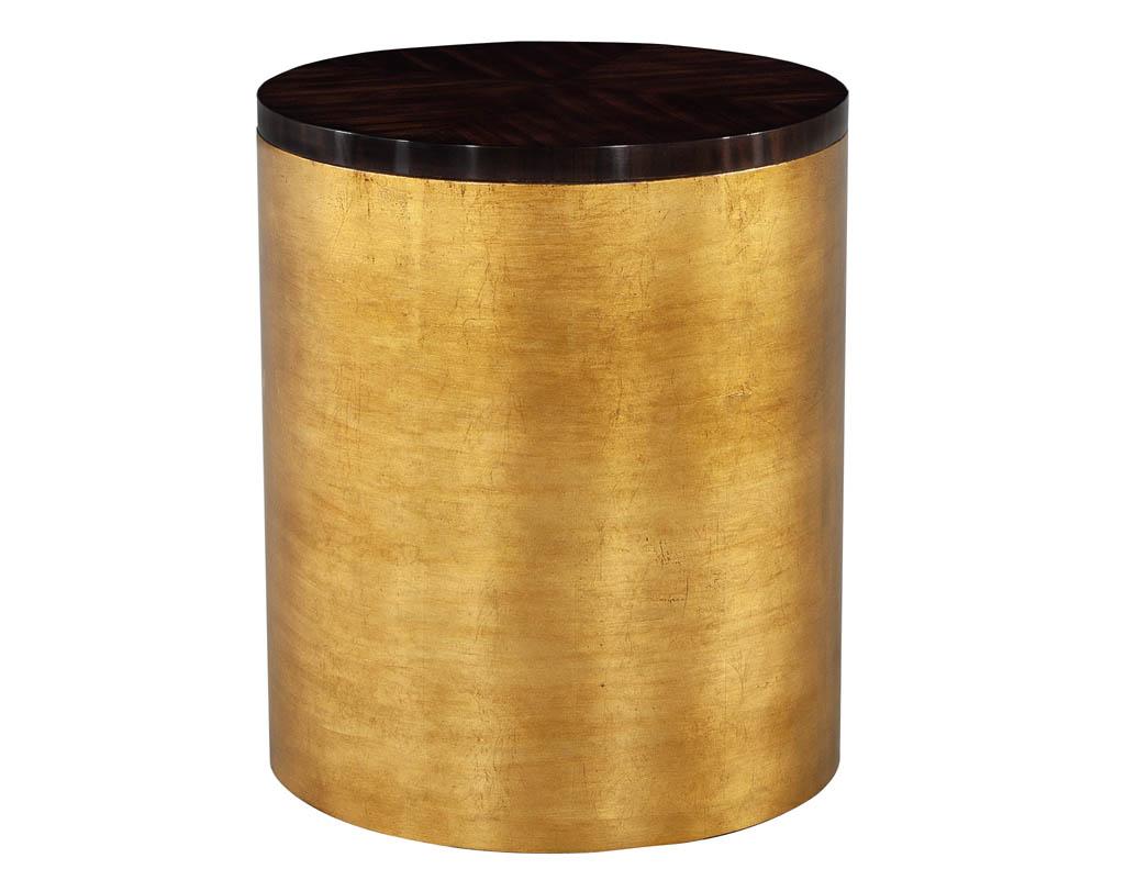 Modern Round Accent Table in Gold Leaf. Beautiful high gloss hand polished book matched walnut top in rich dark espresso brown finish. Magnificently hand applied gold leaf pedestal with a lacquered topcoat to preserve. Limited edition with only one