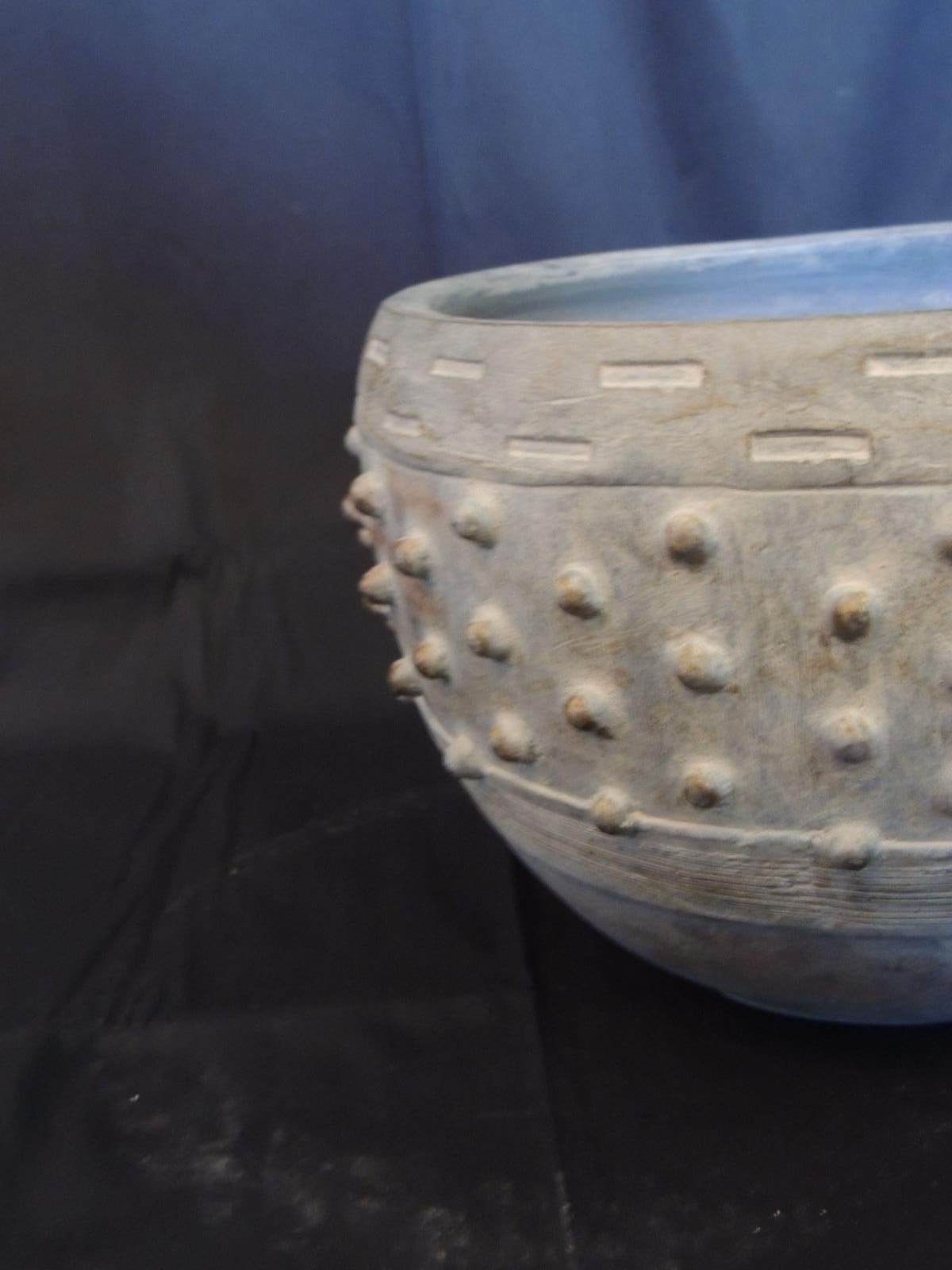 Clay and cement dust round planter.
Size: 10