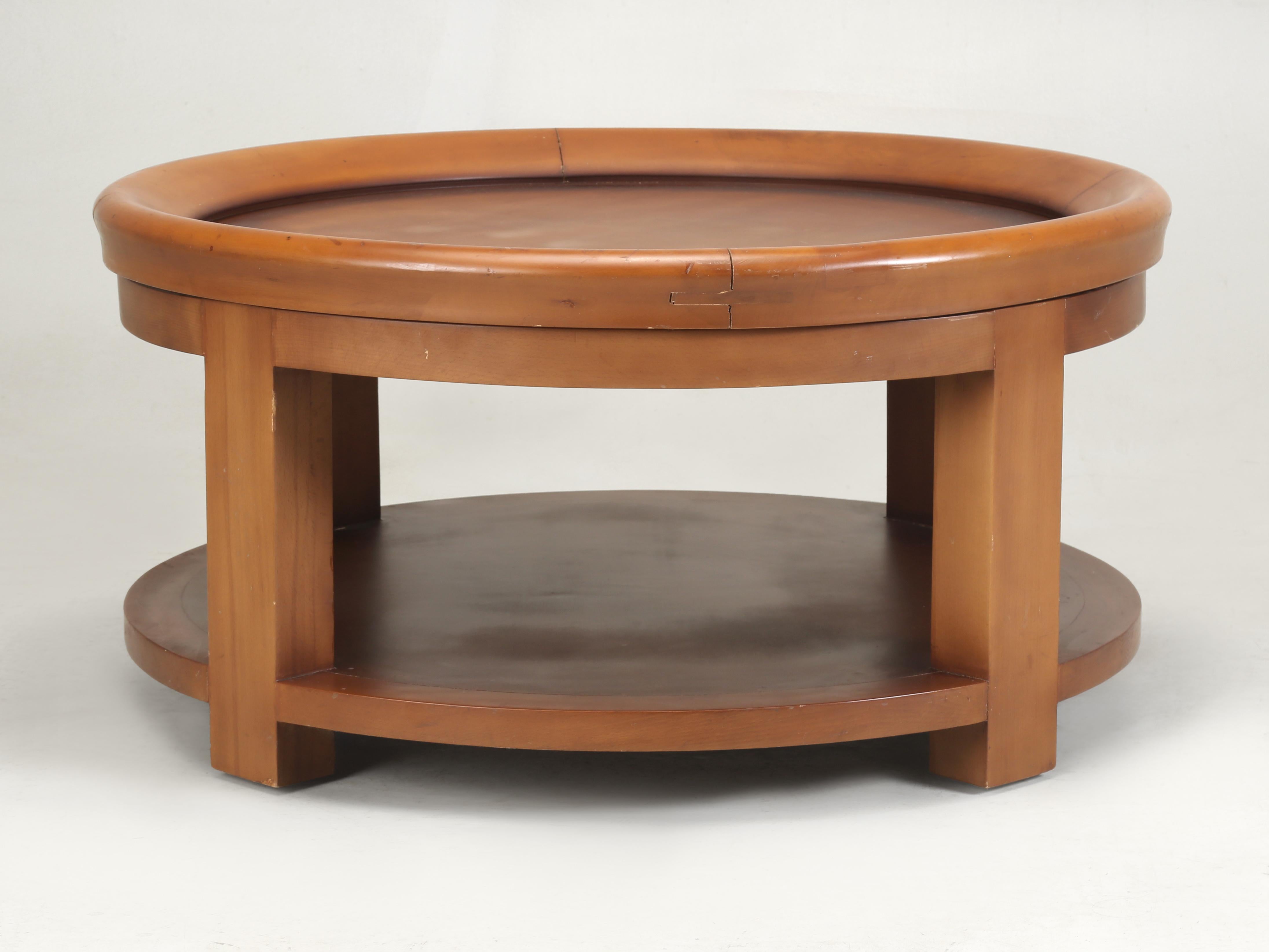 Modern Round Coffee Table Extremely Well Constructed and idea for resting your feet while watching television. This was specially built for an Interior Designer about 20-years ago or more and sort of left unfinished. There was talk of covering it