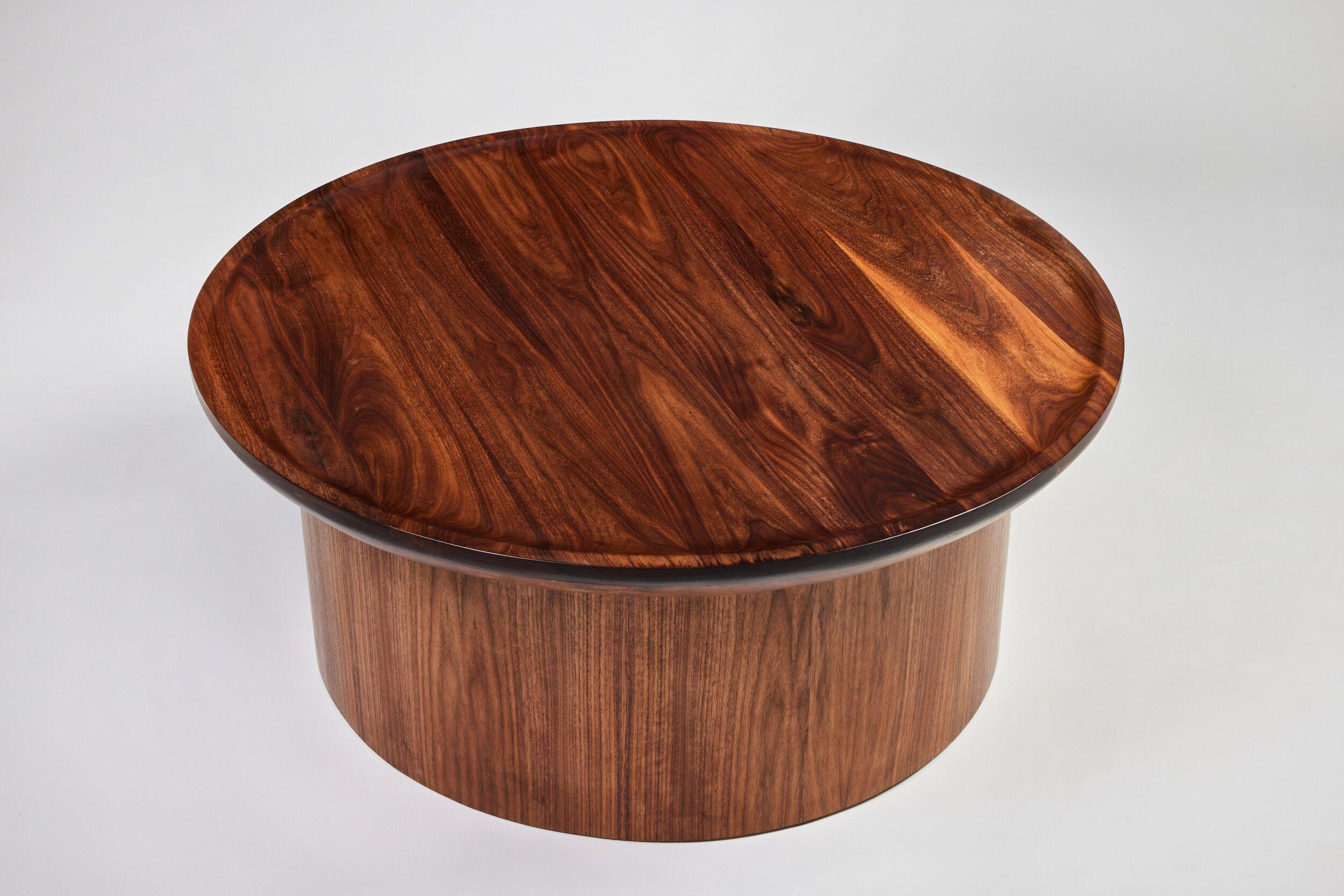 Martin & Brockett's Findley Round Coffee Table features the Findley Collection’s signature carved, curved lip and round pedestal base. Shown in Walnut 

H 17 in. x W 40 in. x D 40 in.

Available for order in additional finishes and sizing.

Part of