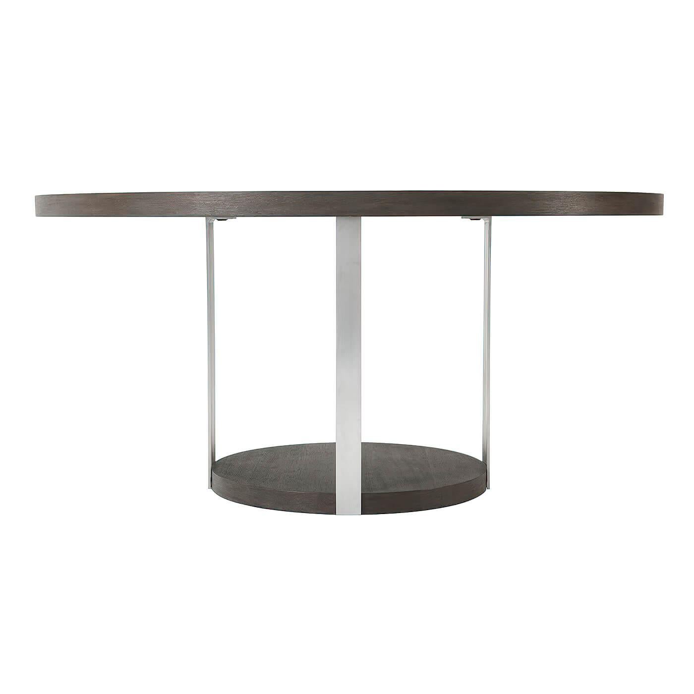 Modern circular Anise finish dining table with four brushed nickel finish supports on a matching round platform base.

Dimensions: 62.25
