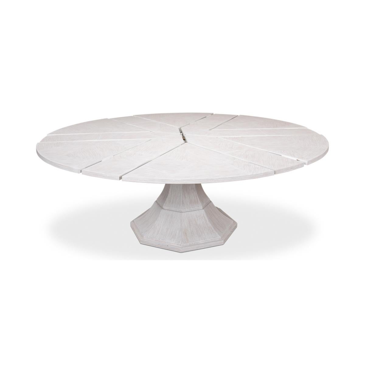  Modern Round oak veneered extension Dining Table with self-storing leaves, on a tapered column form pedestal base.

Open dimensions: 84