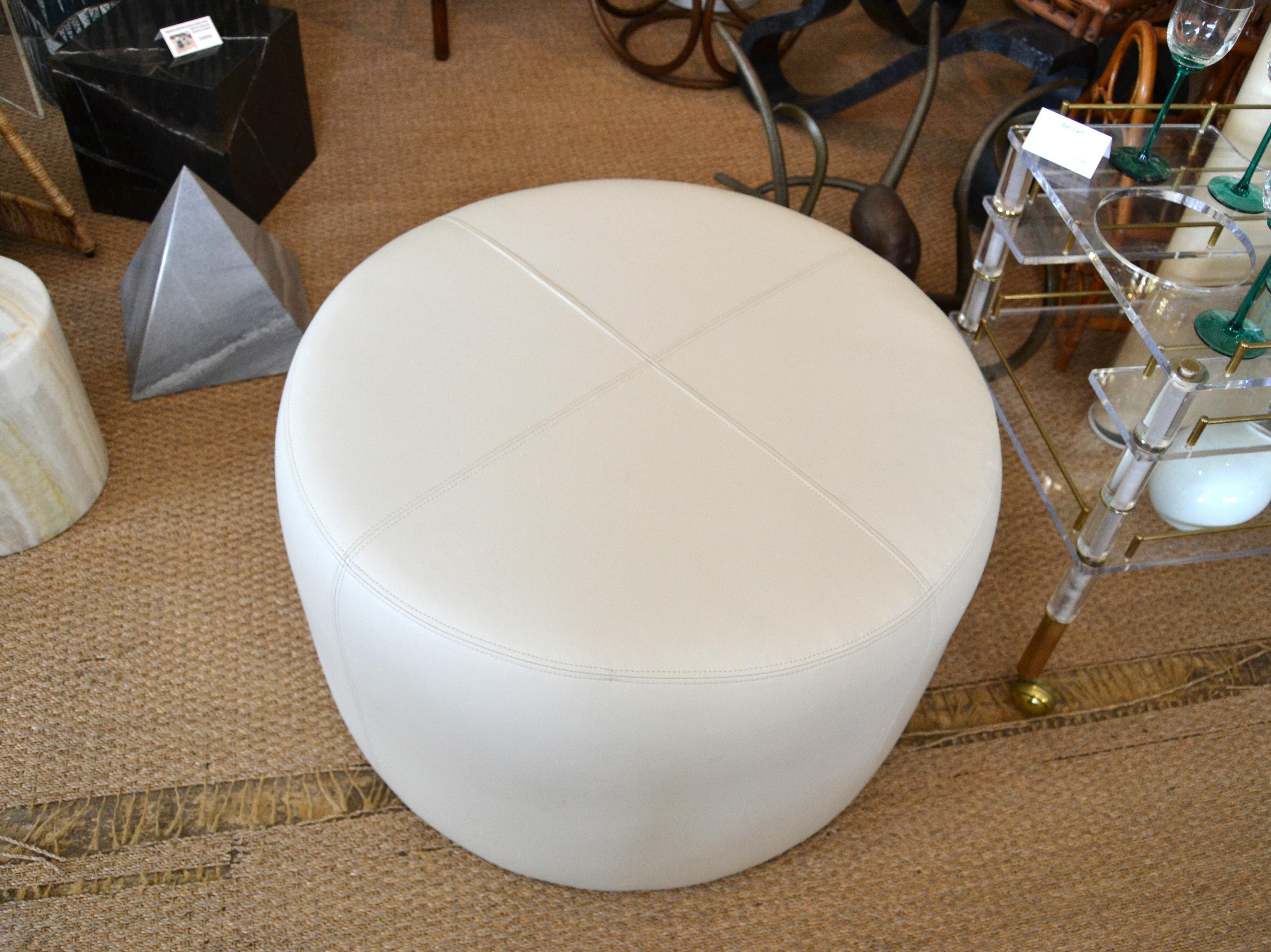 beige leather ottoman