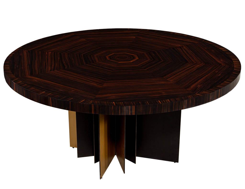 Modern round macassar dining table with metal base. Elegant polished book matched Macassar top on custom one of a kind oiled bronze and brass finished steel fan base. The perfect dining table or foyer table for a large entrance way.

Price
