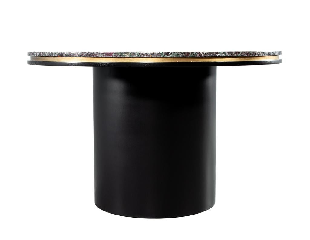 Elevate your dining experience with our stunning modern round marble top dining table, a perfect blend of elegance and modern design. This exquisite piece features a unique marble stone top that showcases captivating violet and rustic green veining,