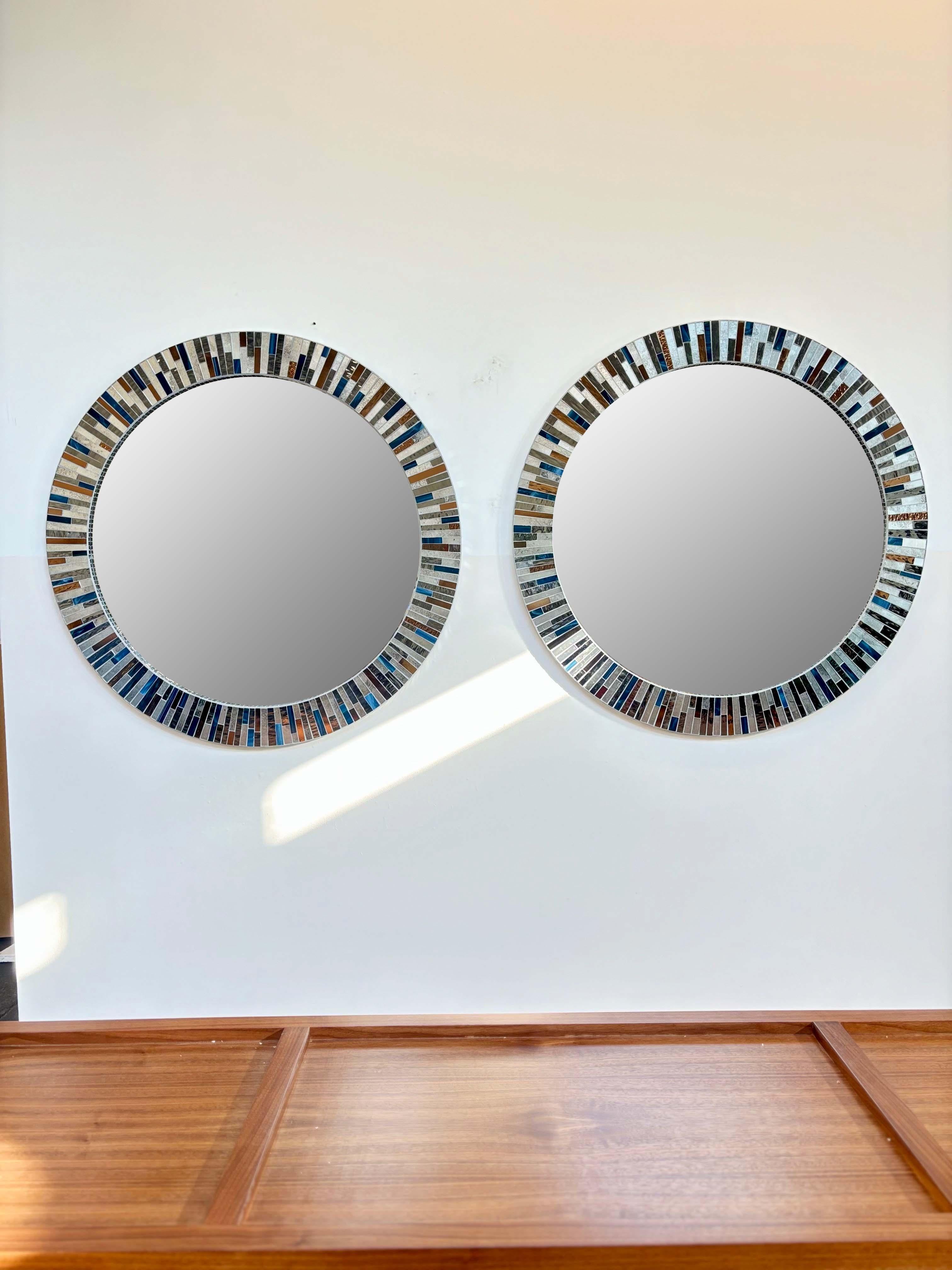 The Modern Round Mirror by Ercole Home features a 4